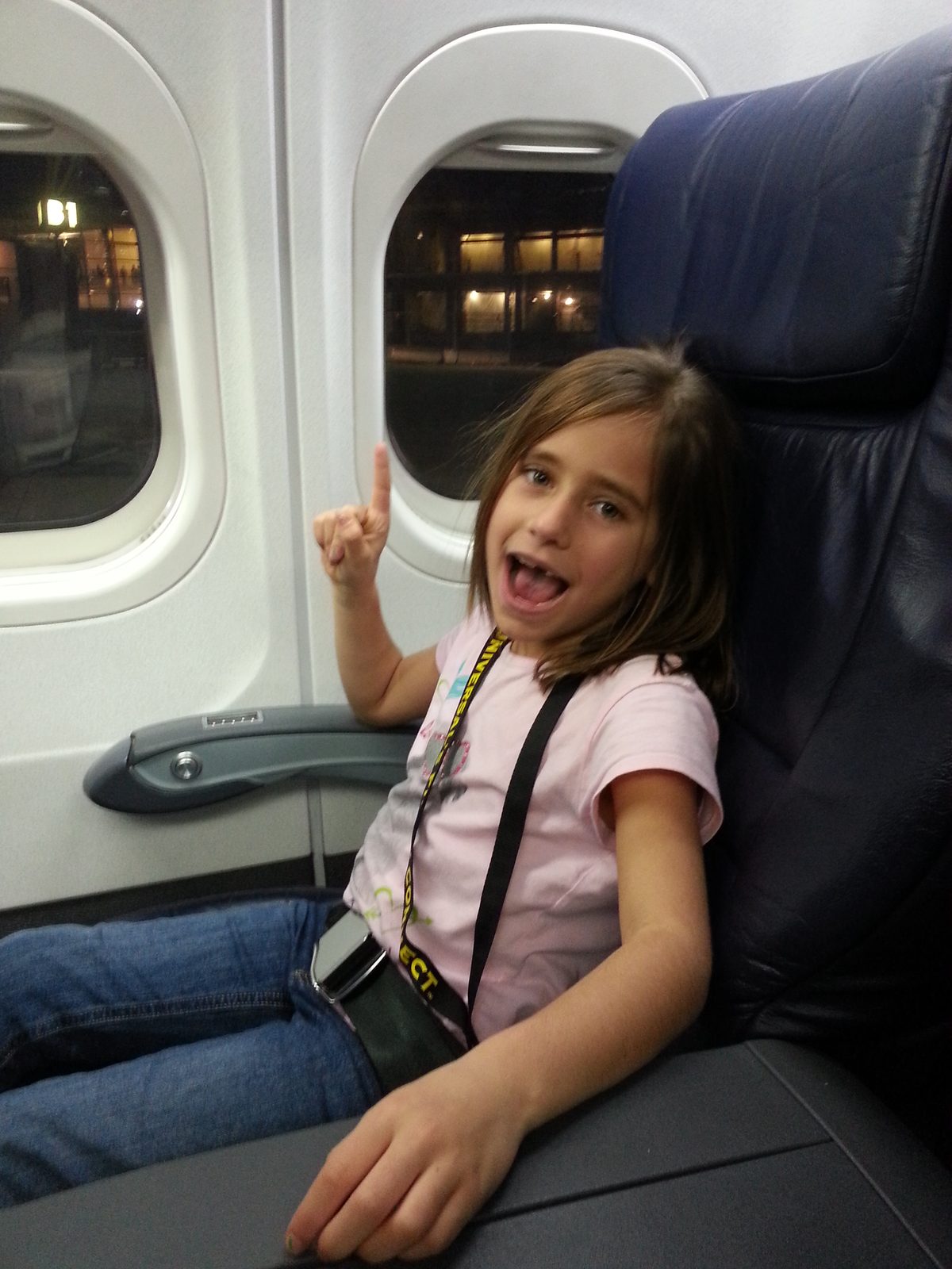 Lisa wide awake on the flight home