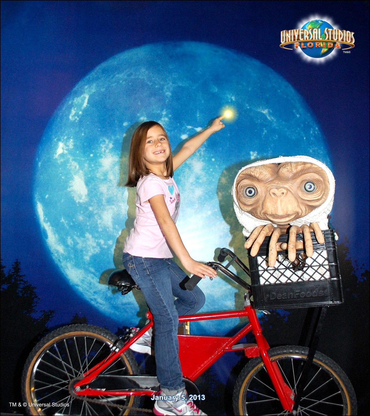 Lisa on the E.T. bike in a souvenir photo