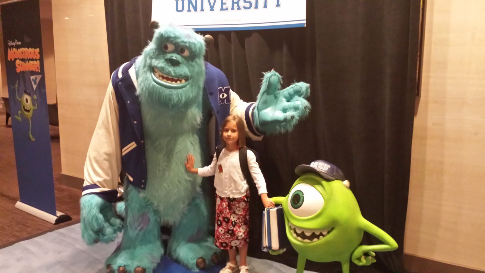 Lisa meets Sulley and Mike Wazowski