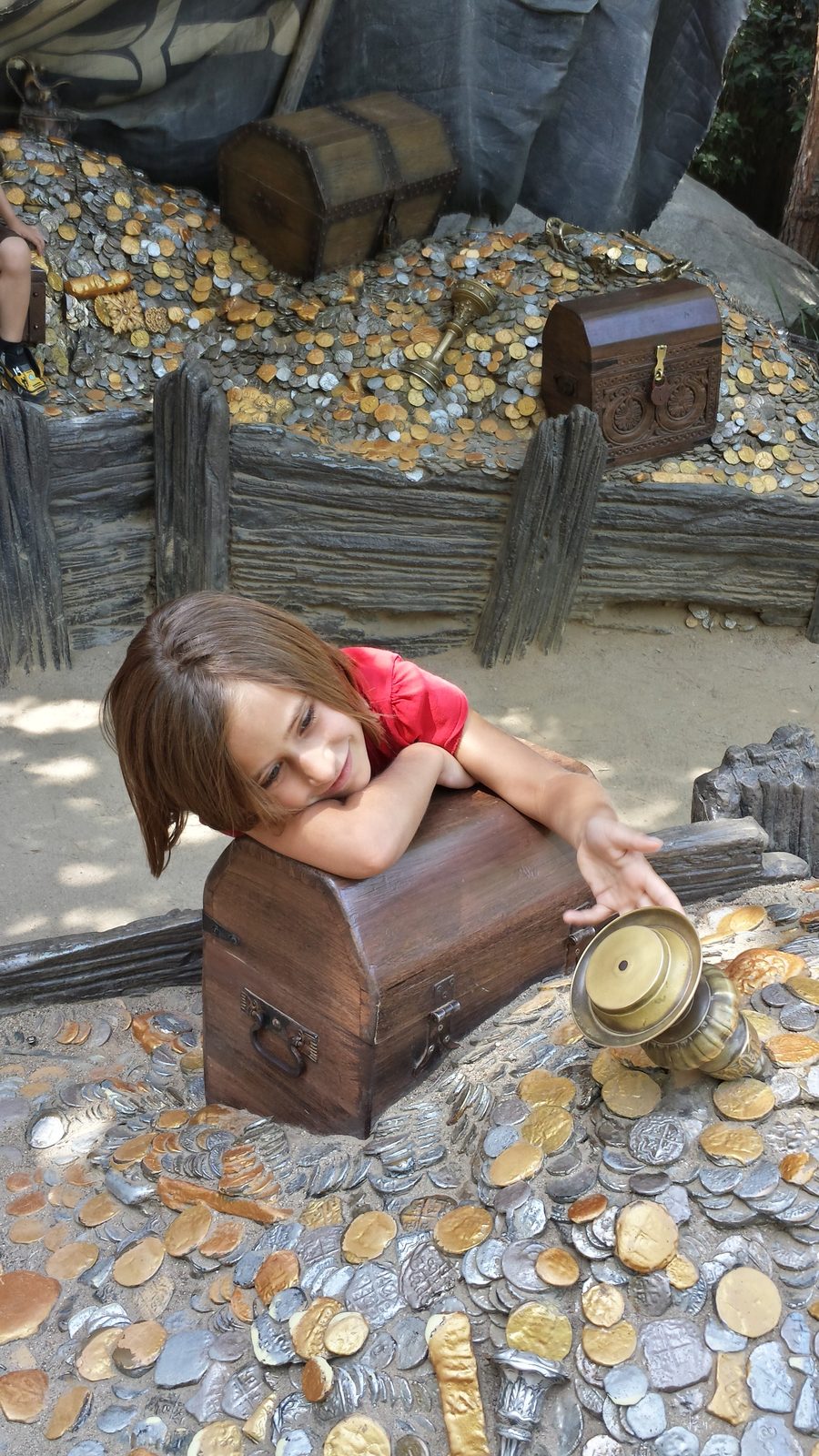 Lisa with the treasure chest at the Pirate's Lair