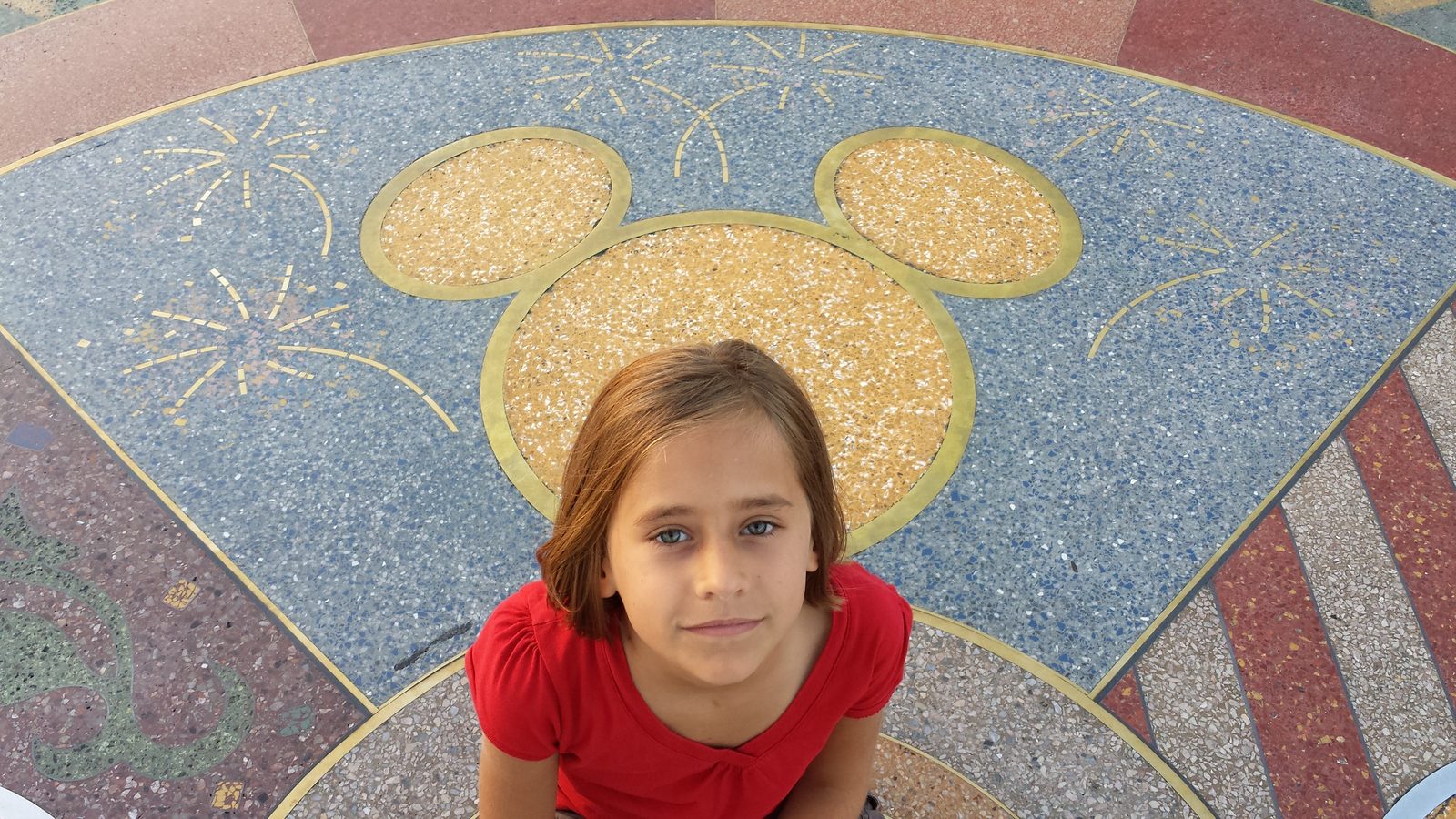 Lisa on the Mickey head at Downtown Disney