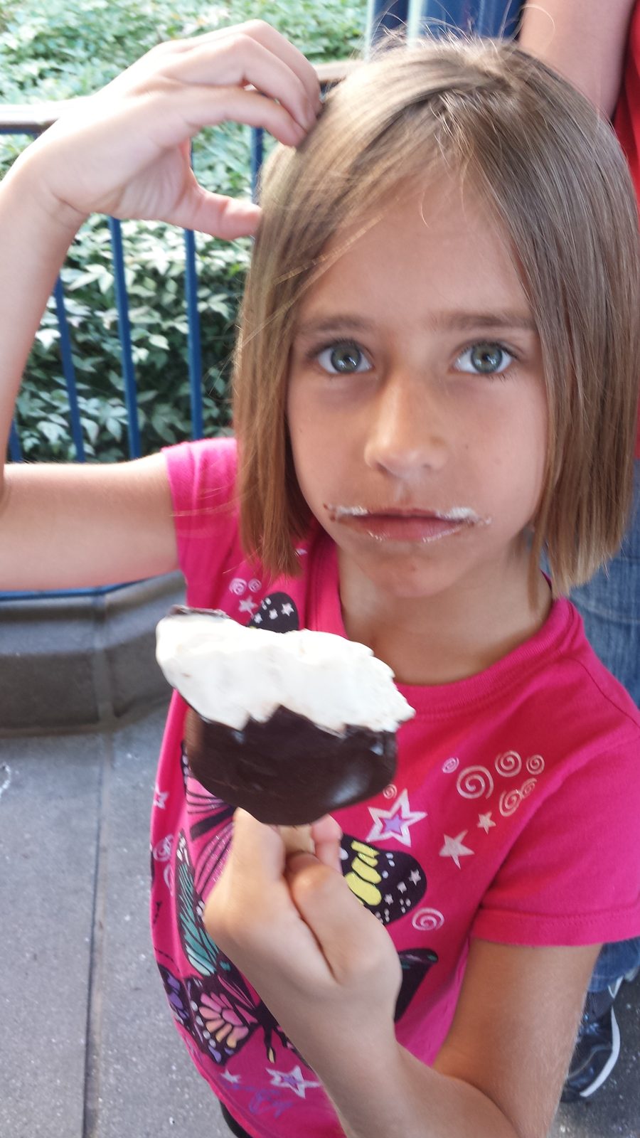 Lisa with an ice cream bar at California Adventure