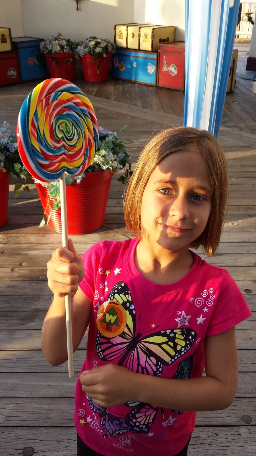 Lisa with her rainbow lollipop