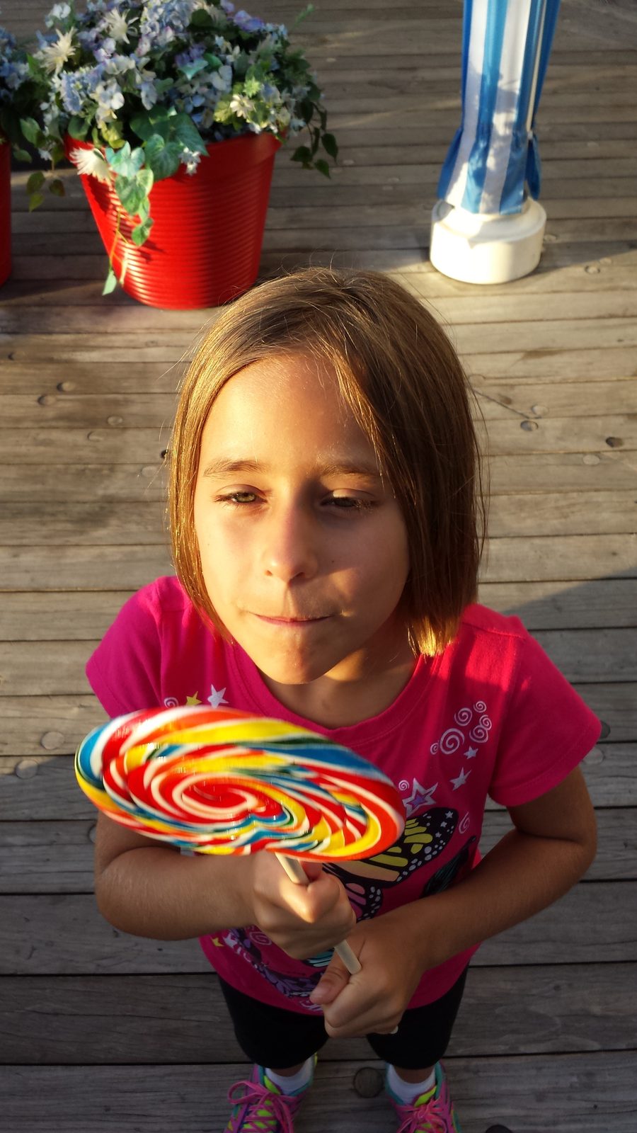 Lisa's rainbow lollipop on Buena Vista Street