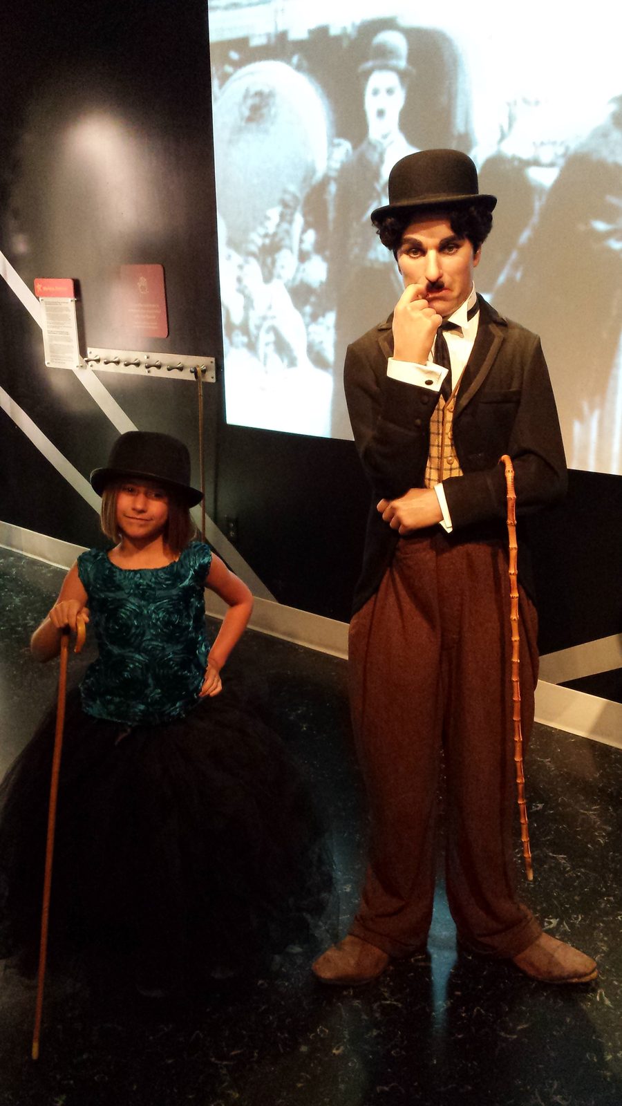 Lisa beside a wax Charlie Chaplin