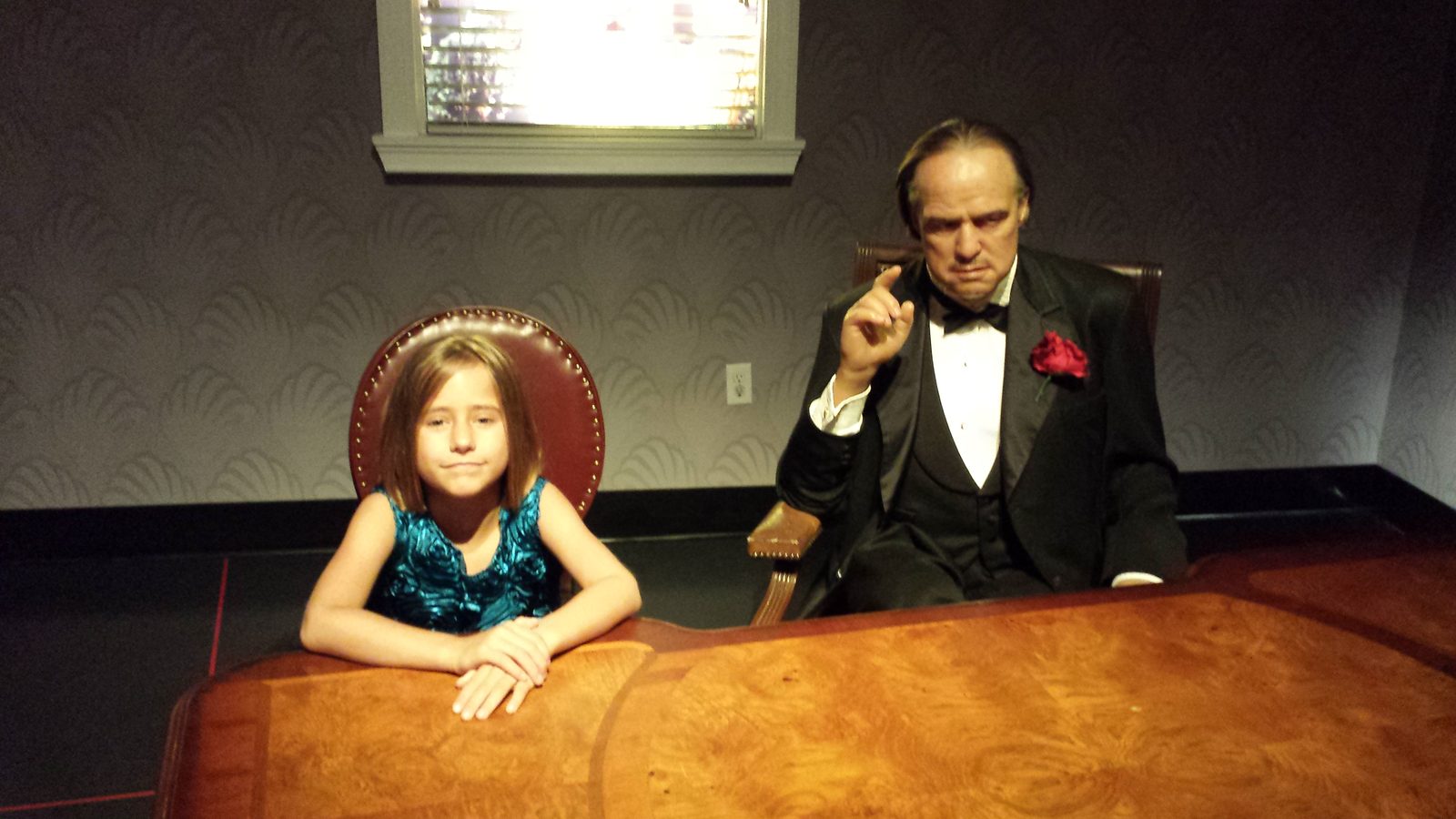 Lisa at the Godfather desk with a wax Marlon Brando