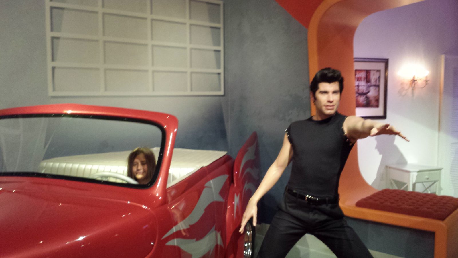 Lisa in the wax Grease convertible