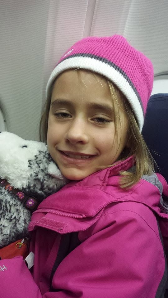 Lisa on the plane, nearly in New York