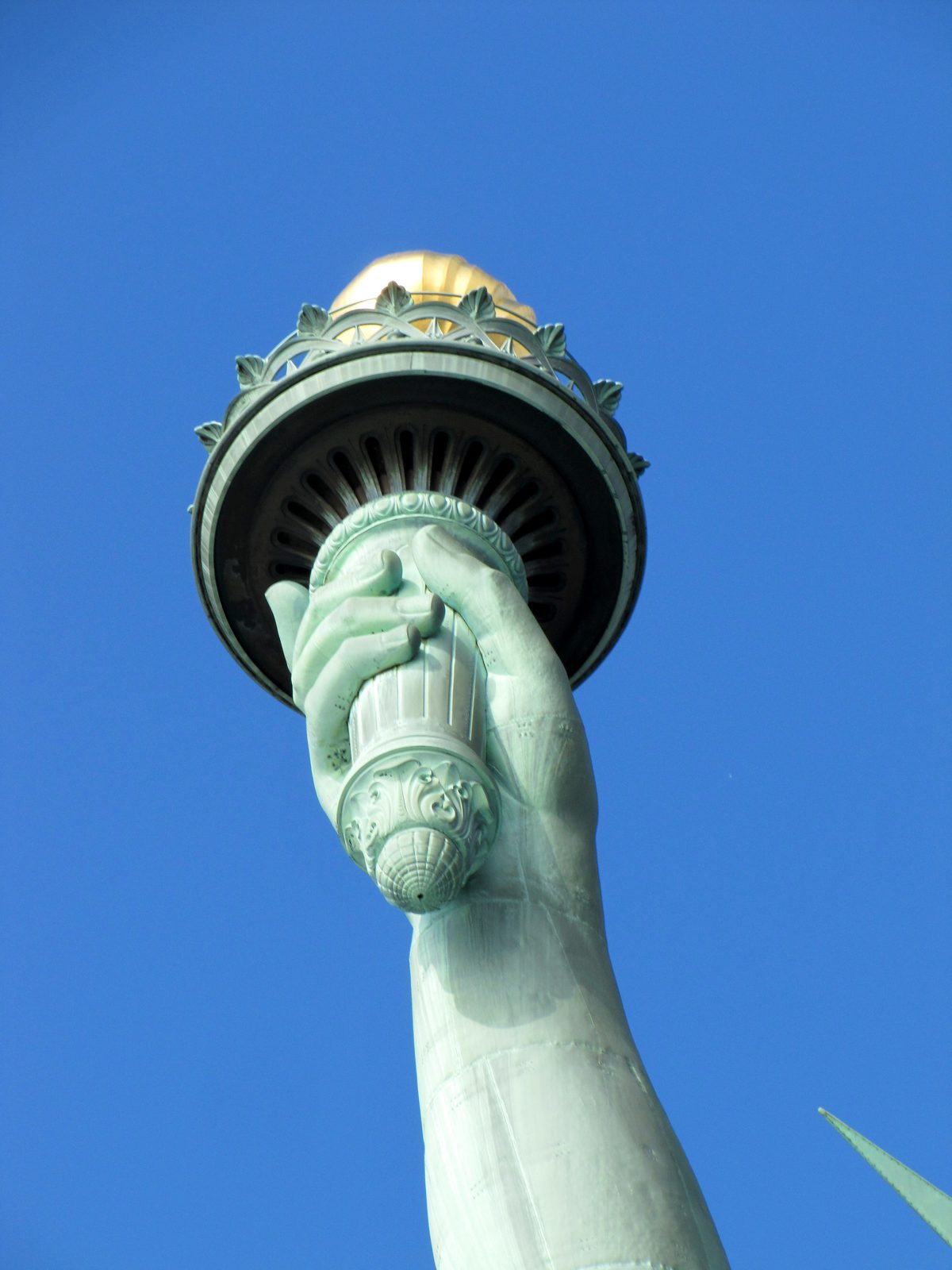 The torch against a clear sky
