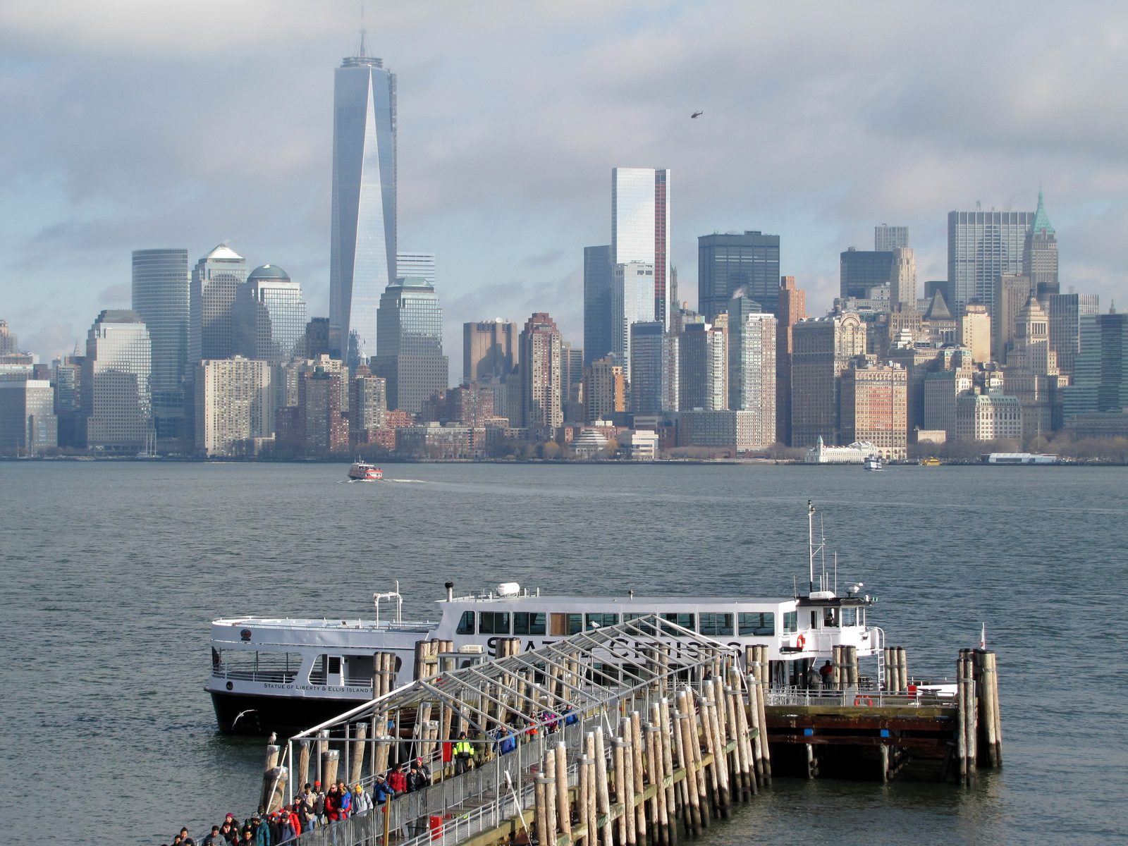 The ferry dock on Liberty Island, Manhattan beyond