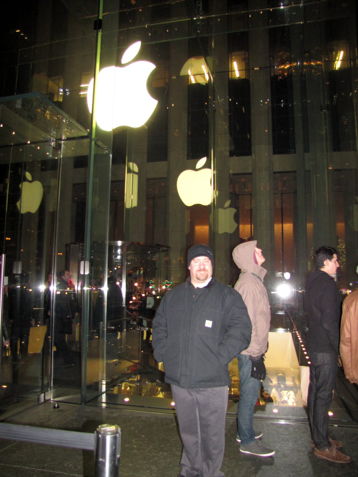 The Apple Store's glass cube at night