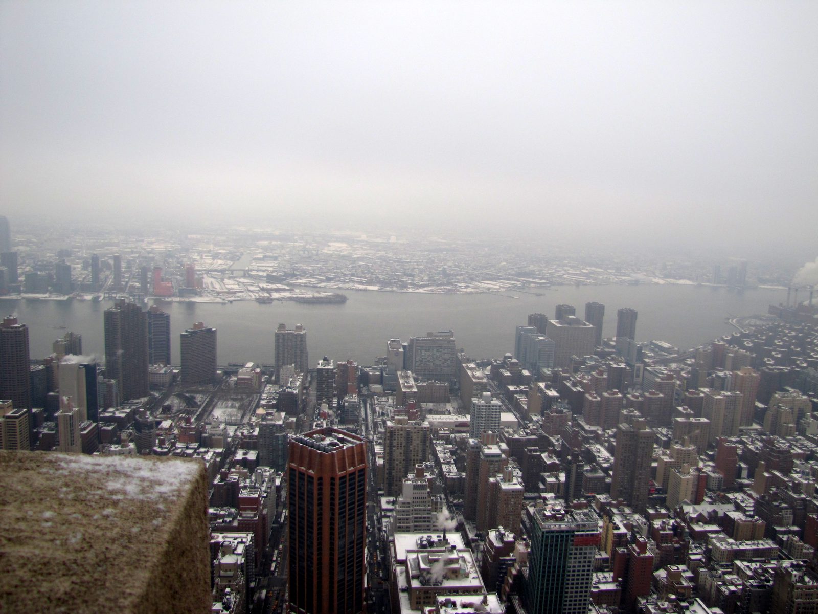 Snow over the rooftops from the 86th floor
