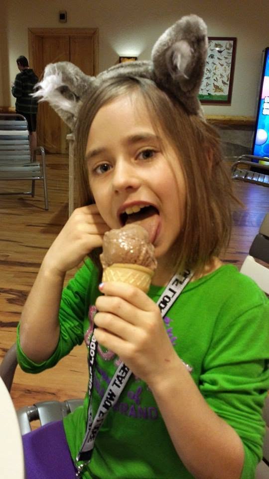 Lisa in her wolf ears with a chocolate cone
