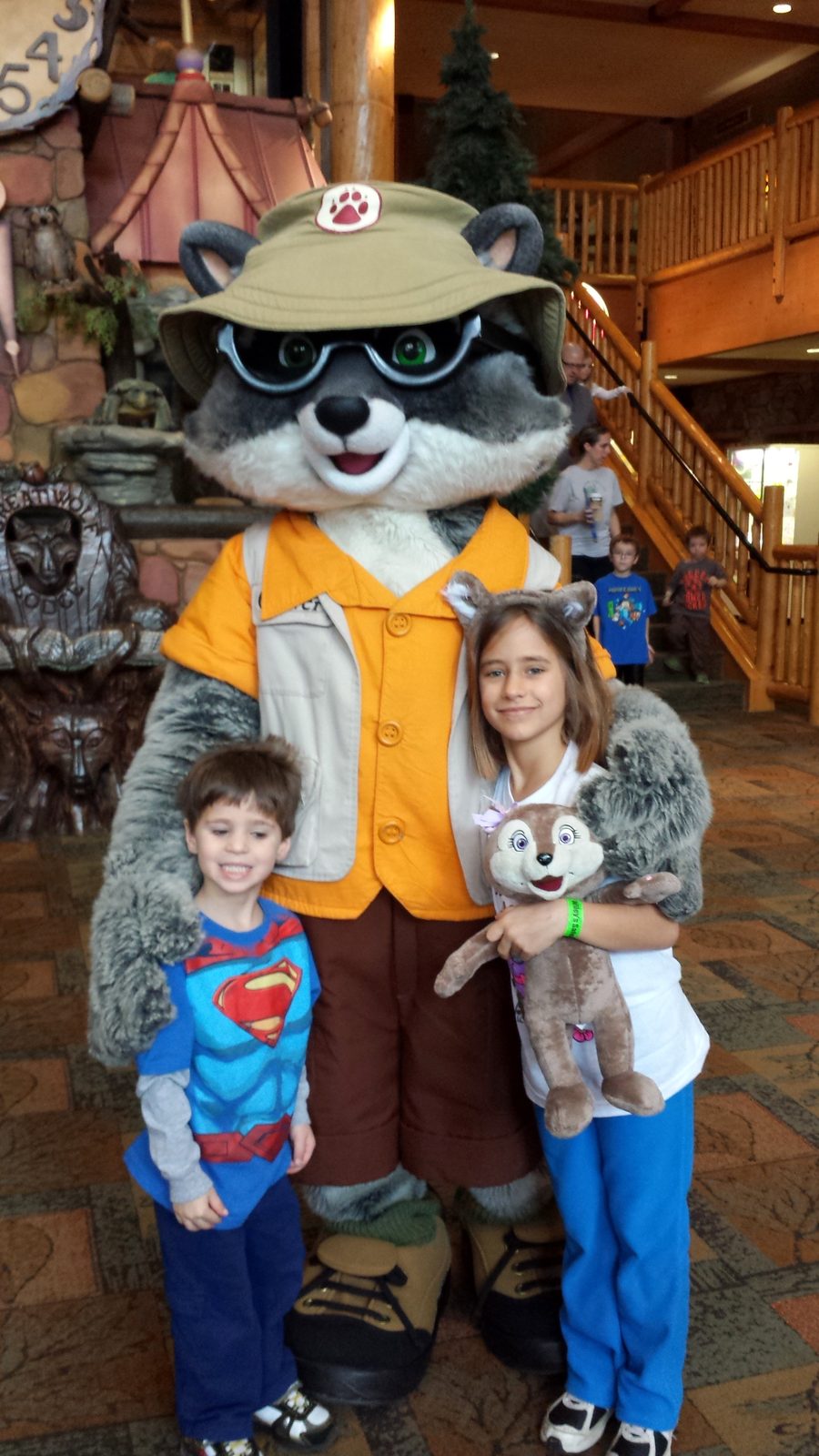 Thomas and Lisa with Oliver Raccoon at Great Wolf Lodge in Traverse City