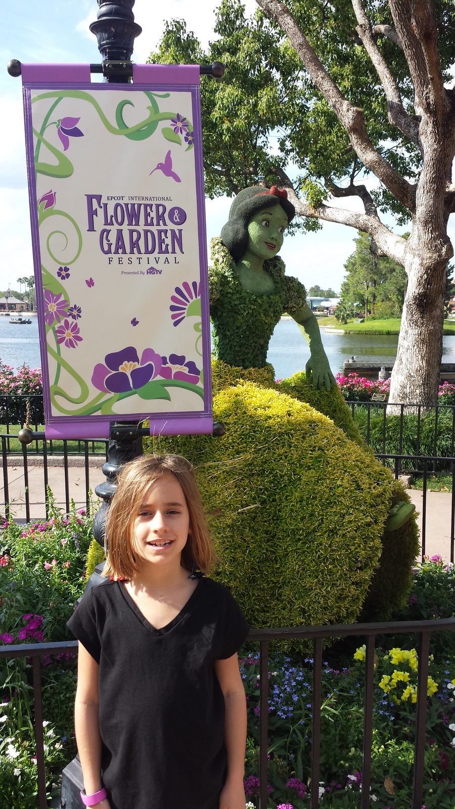 Lisa by the Snow White topiary at Epcot