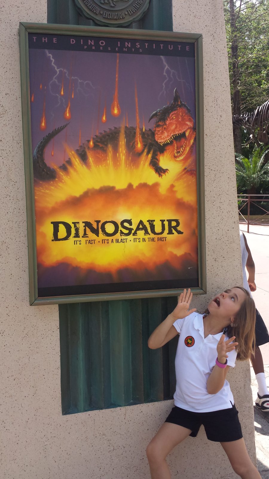 Lisa at the Dinosaur sign in DinoLand