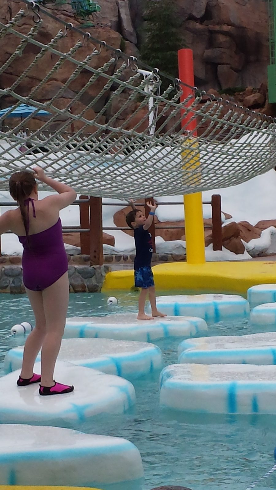 Kathy making her way across the floating pads