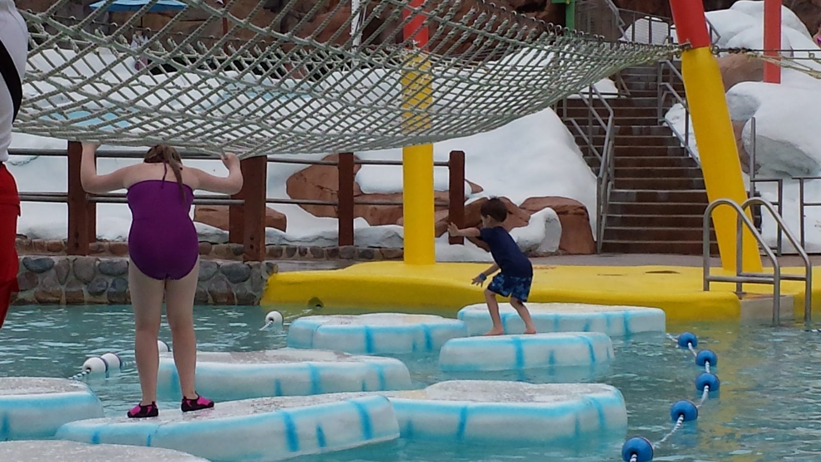 Lisa and Thomas on the floating obstacle course