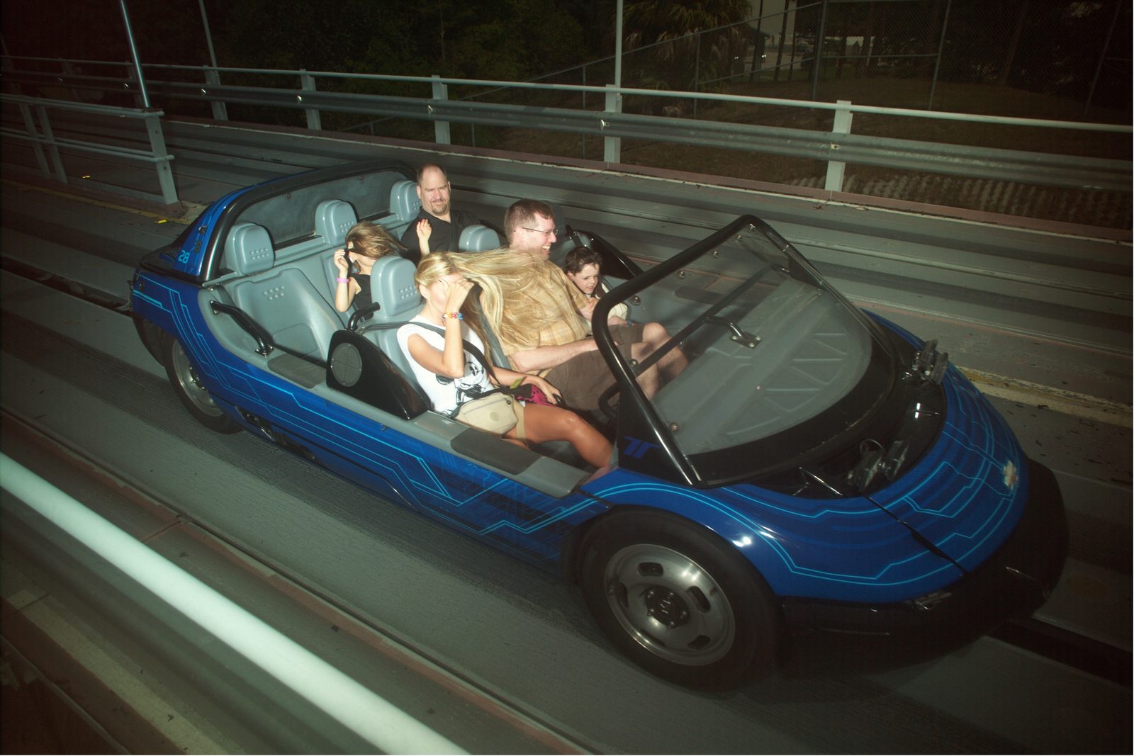 The whole family packed into Test Track for Lisa's first ride
