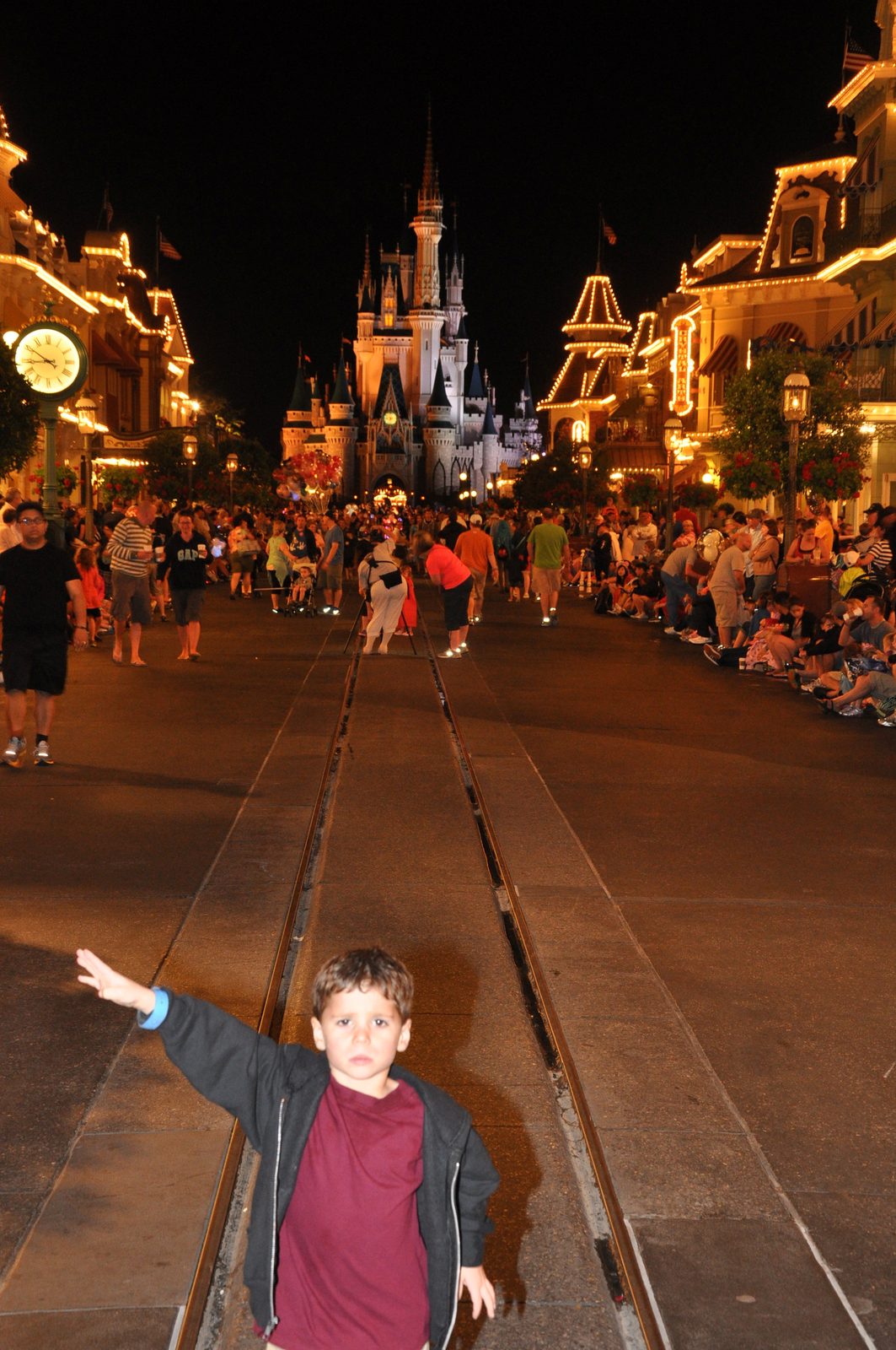 Thomas dashing down Main Street under the castle lights