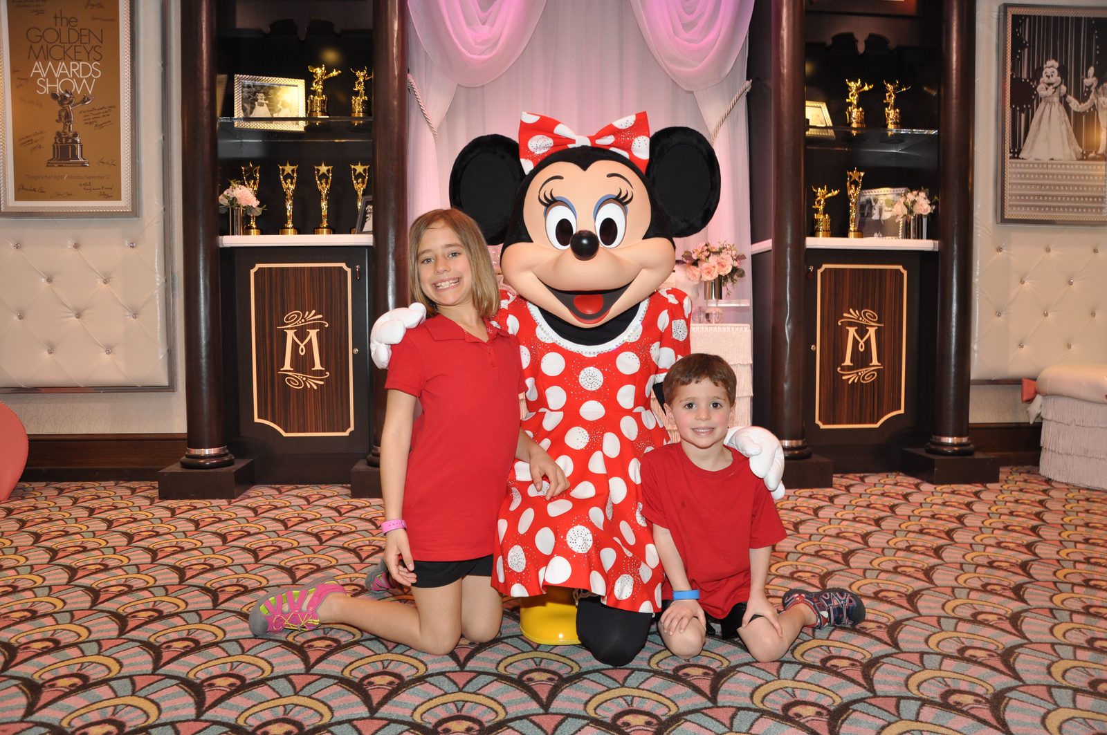 Lisa and Thomas hug Minnie Mouse