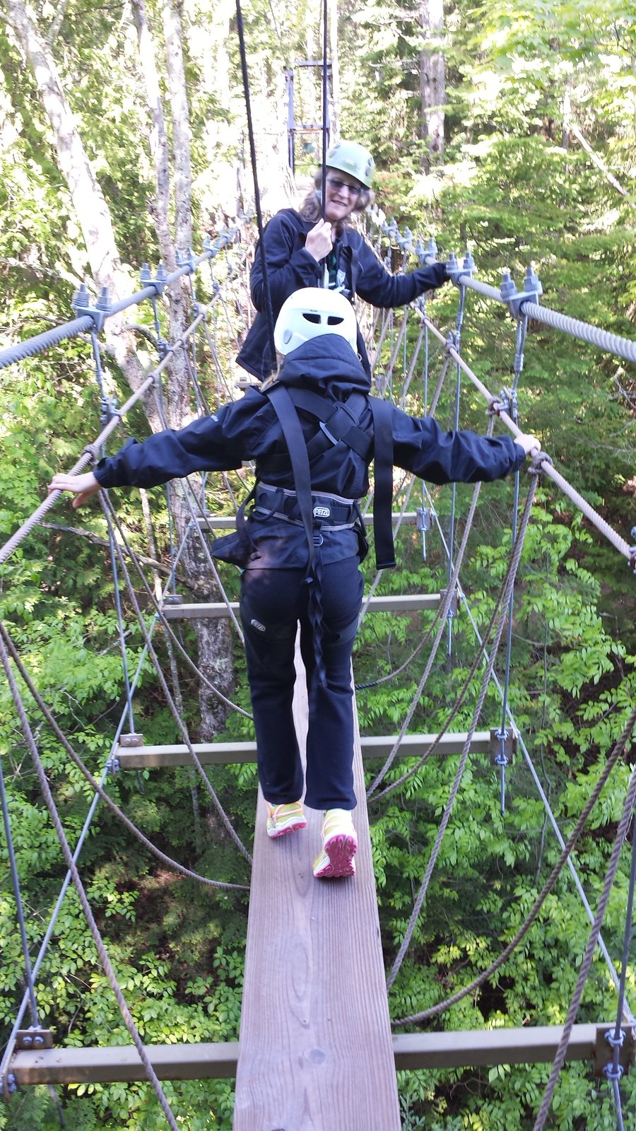 Lisa on the suspension bridge at Mill Creek