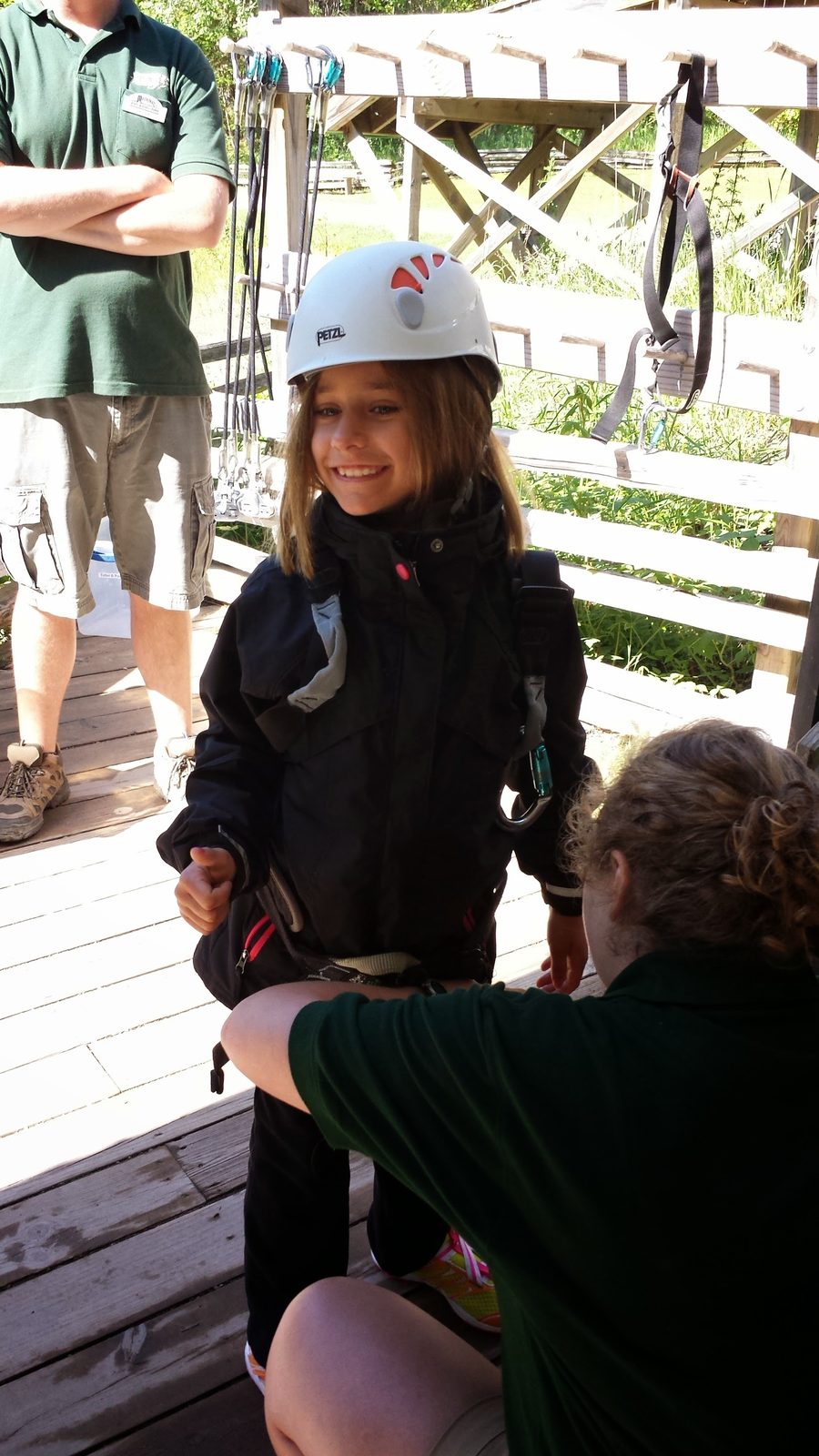 Getting harnessed up for the zip line