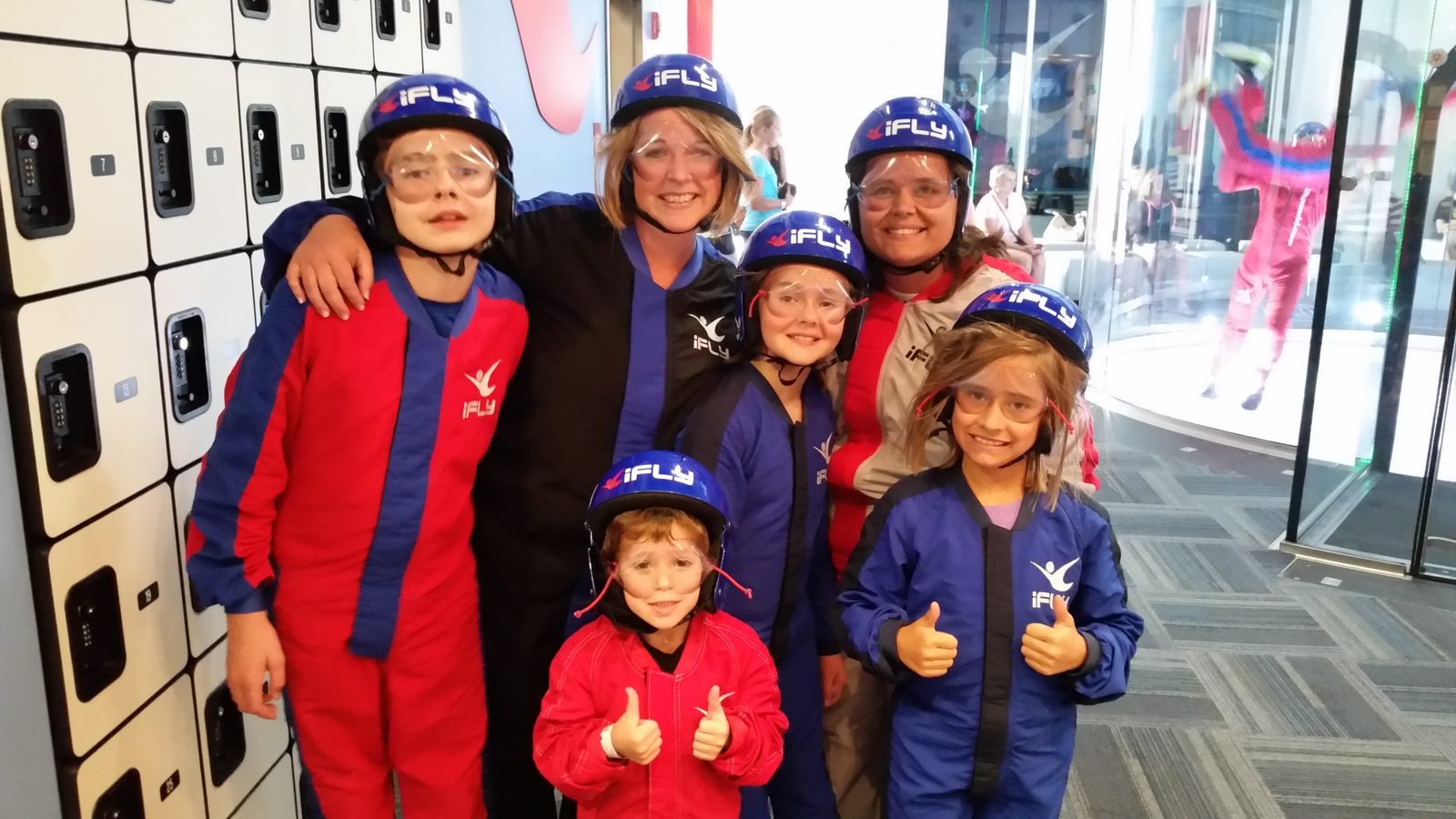 Our whole family ready for indoor skydiving