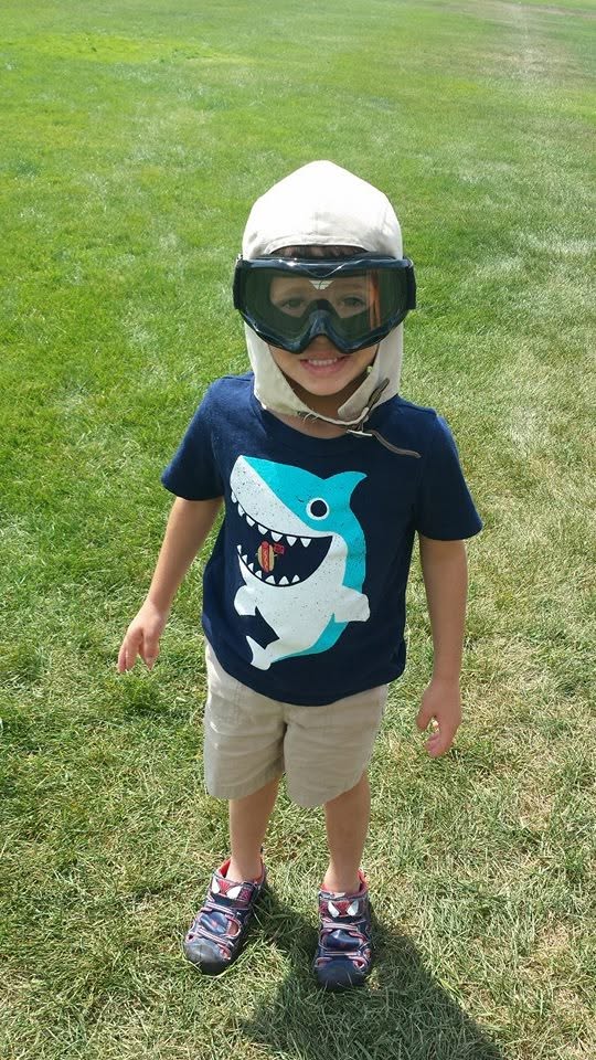 Thomas in his flying cap and goggles