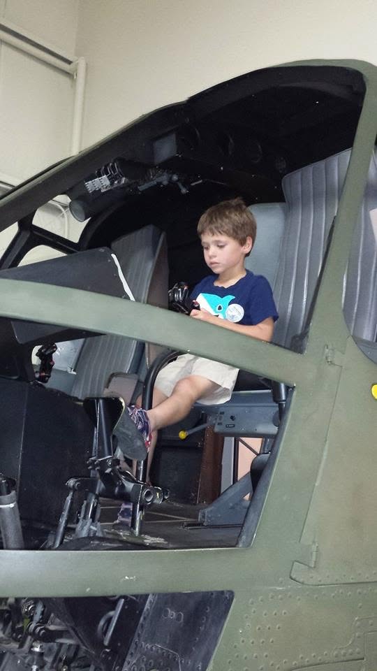 Thomas in the helicopter at the Air Zoo
