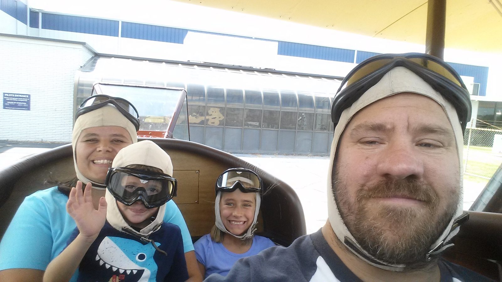 All of us in the wide front seat before takeoff