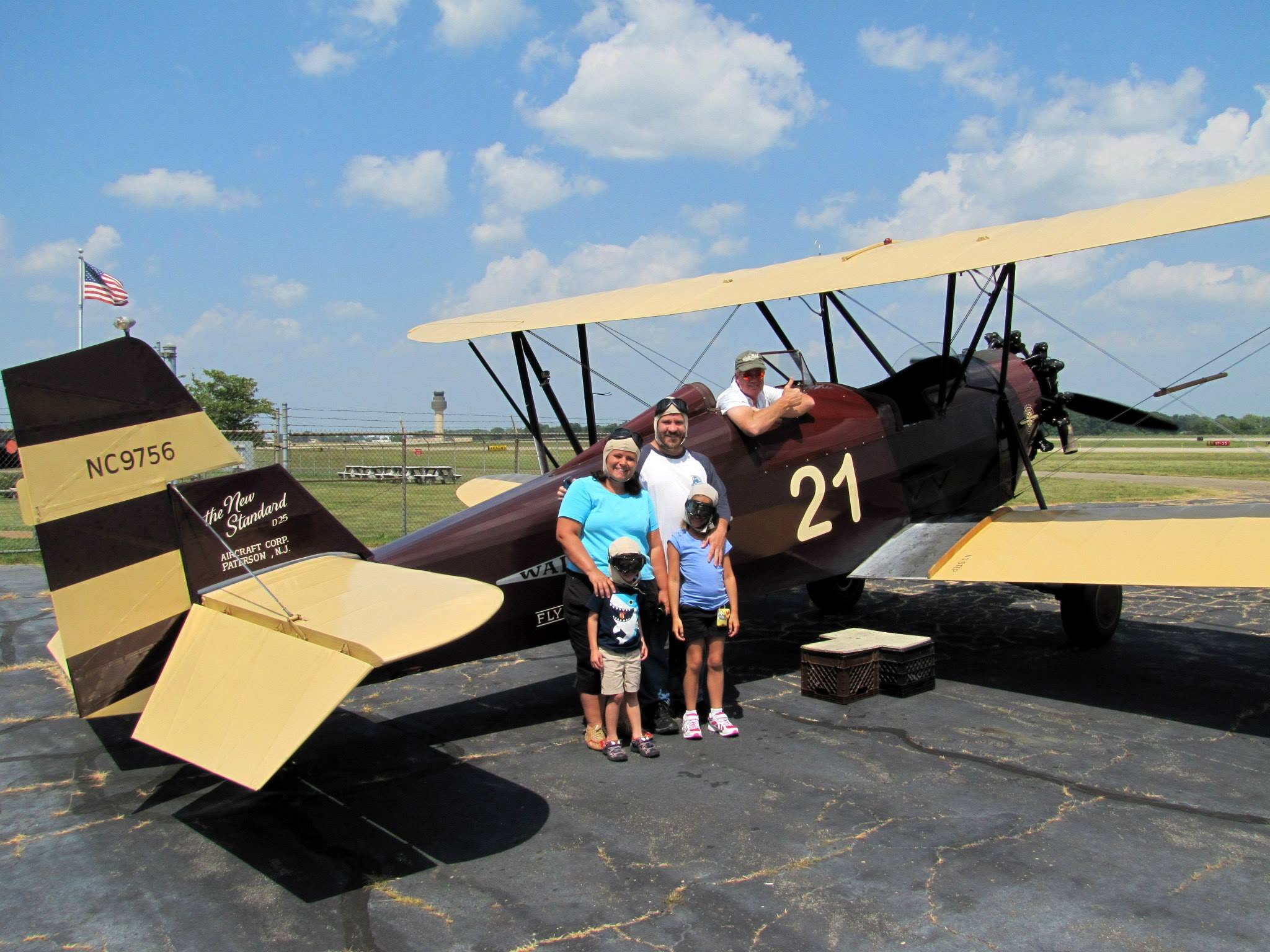 Kathy, Lisa, Thomas and Michael with our plane, the New Standard D-25