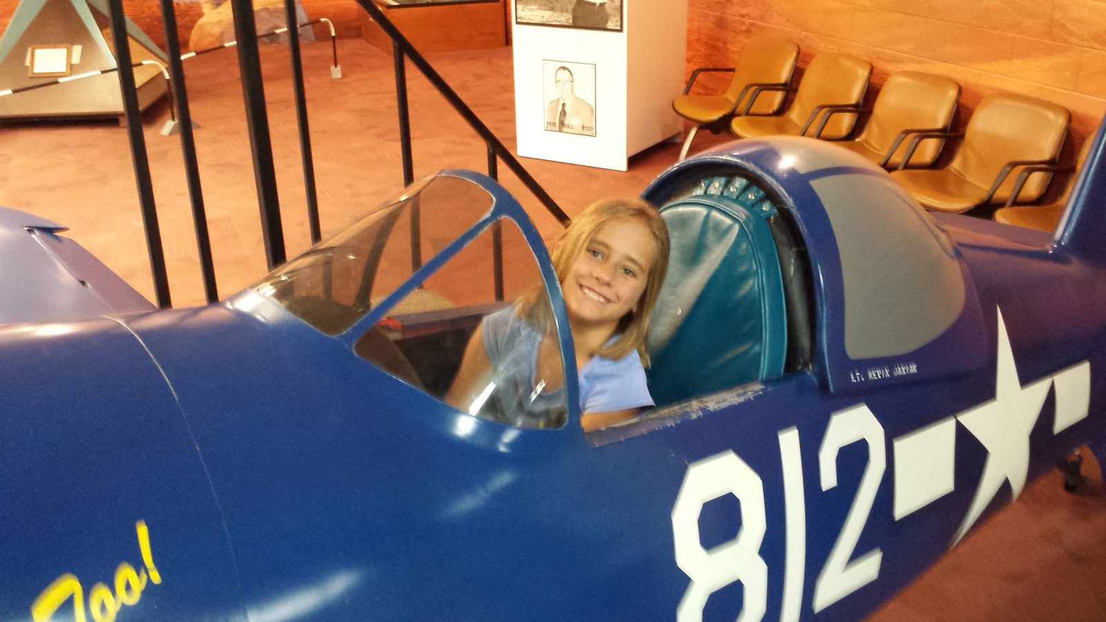 Lisa in a cockpit display at the Air Zoo