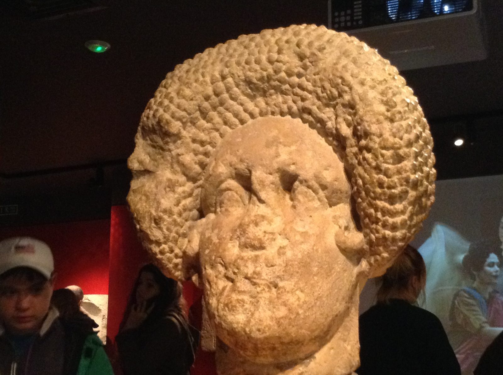 Carved stone face in the Roman Baths museum