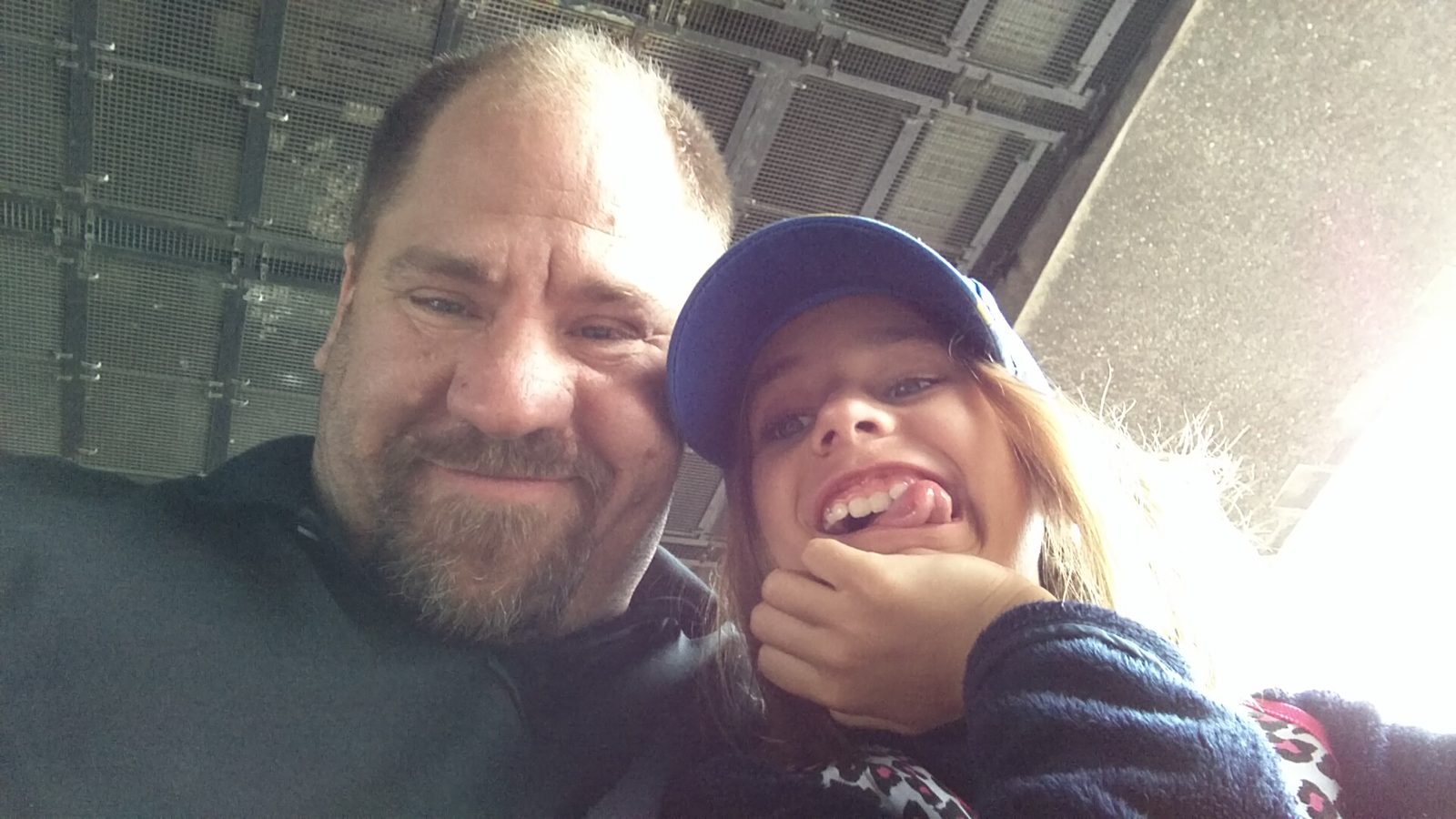 Making faces under the bridge