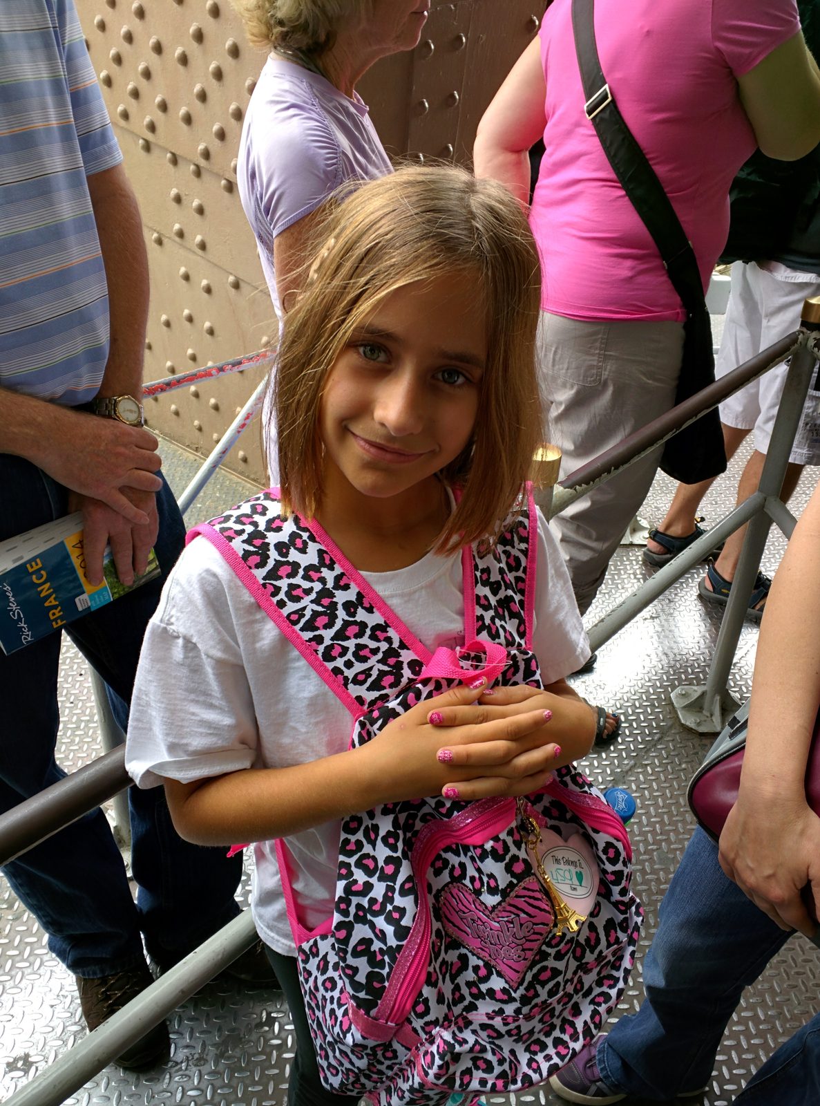 Lisa guarding her bag from pickpockets, while waiting in line for the summit
