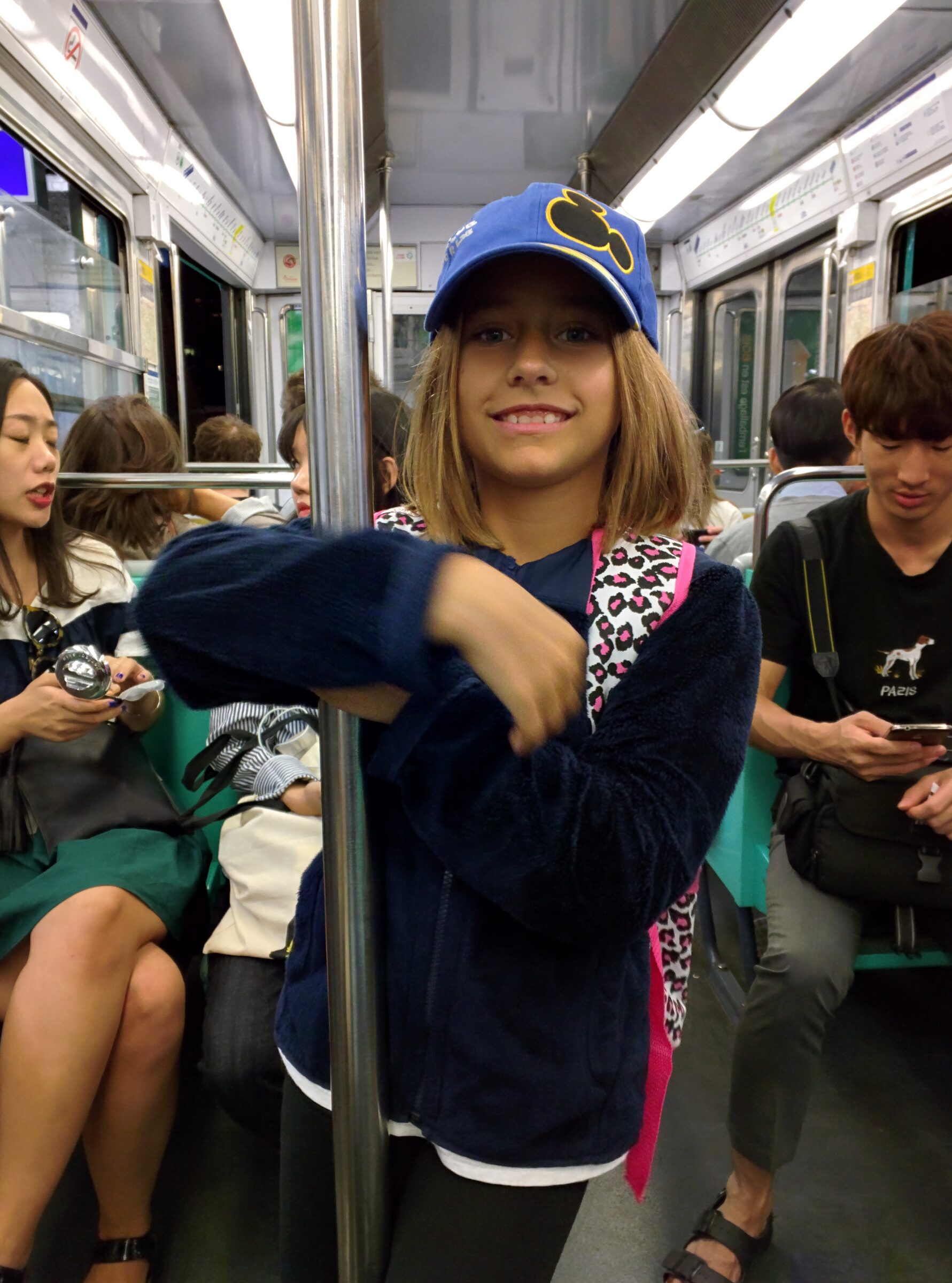 Lisa goofing around on the Paris Metro
