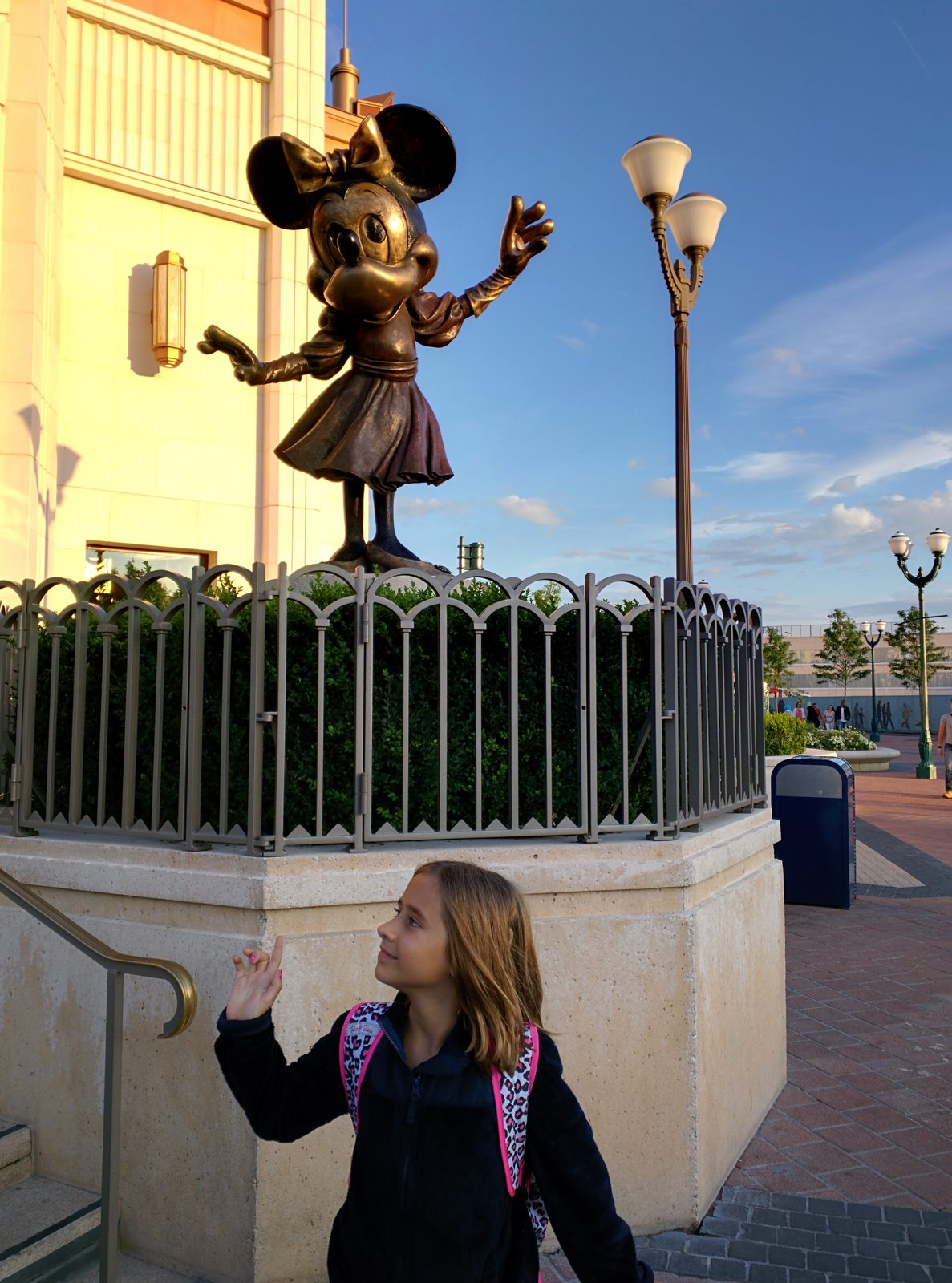 Lisa saying hello to the Minnie statue
