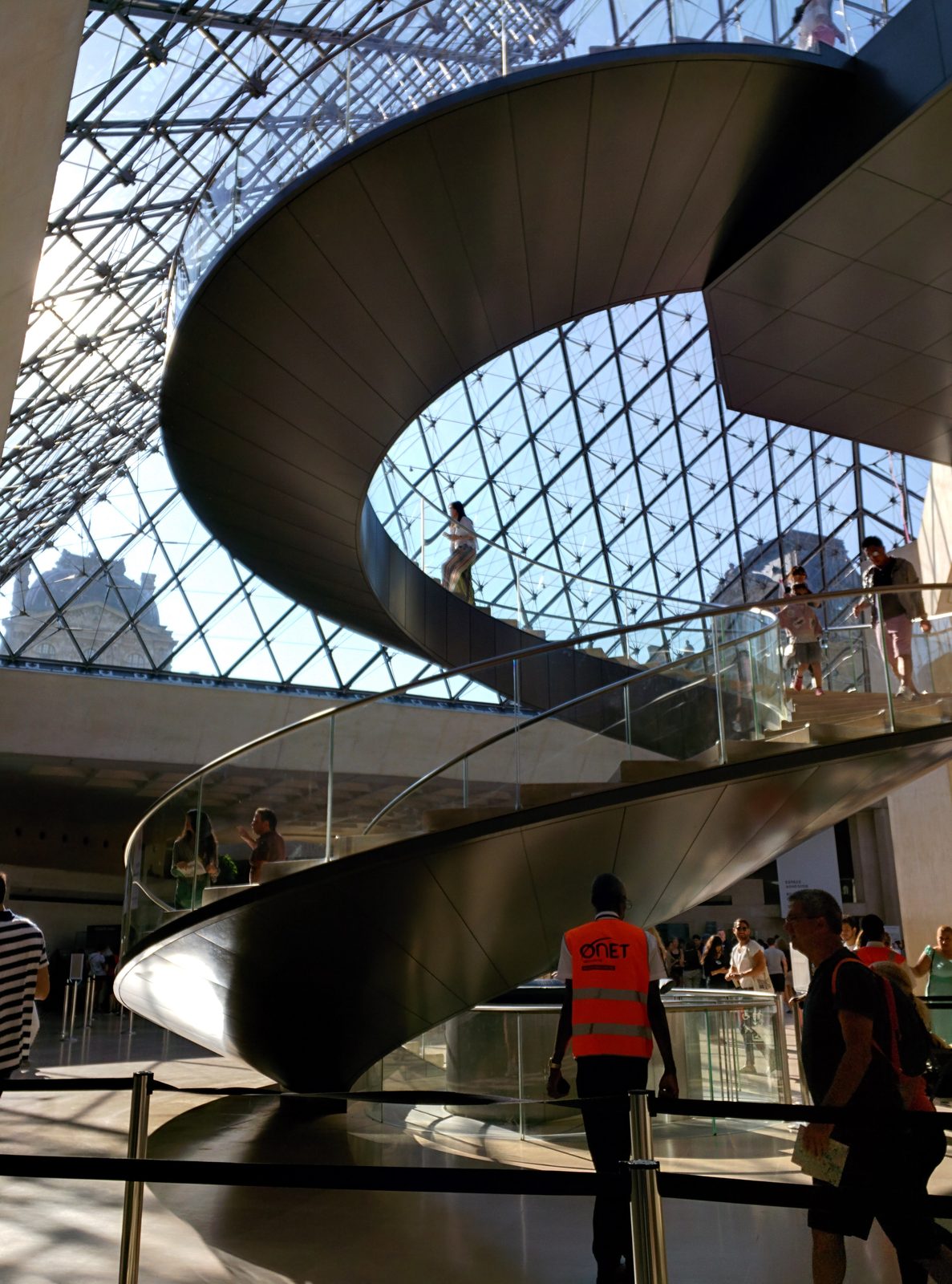 The spiral staircase under the Louvre pyramid