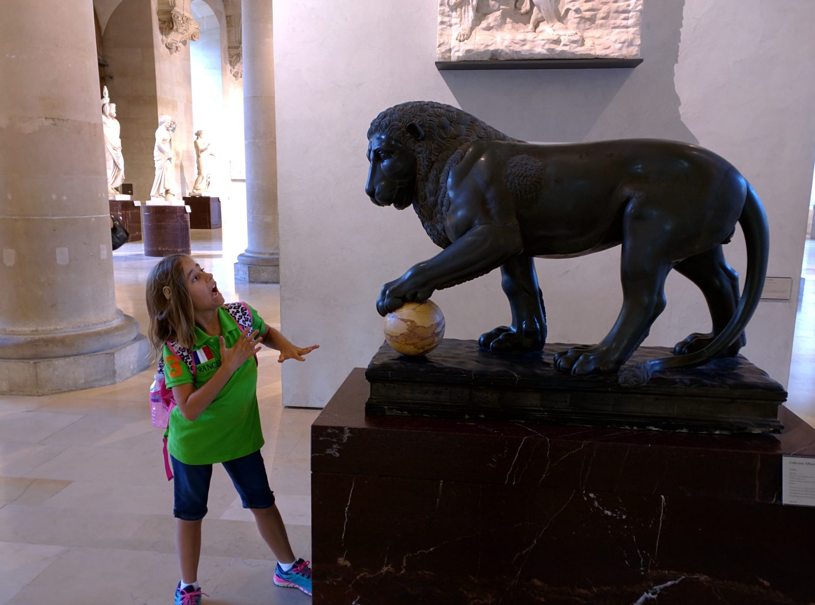 Lisa roaring back at the bronze lion