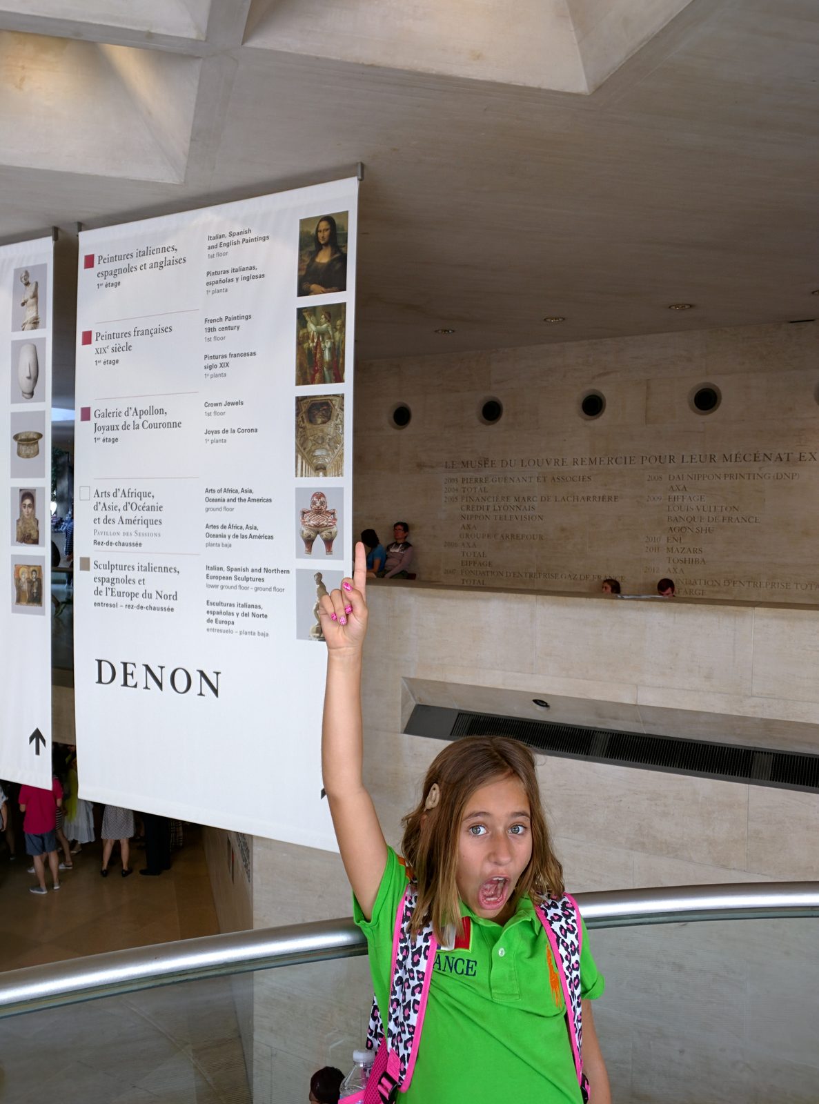 Lisa pointing the way to the Mona Lisa