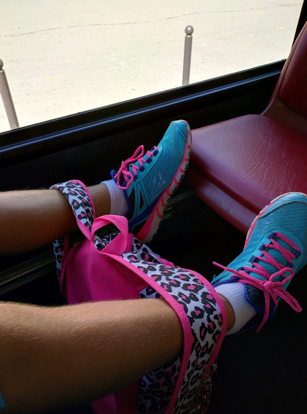 Lisa's feet up on the bus
