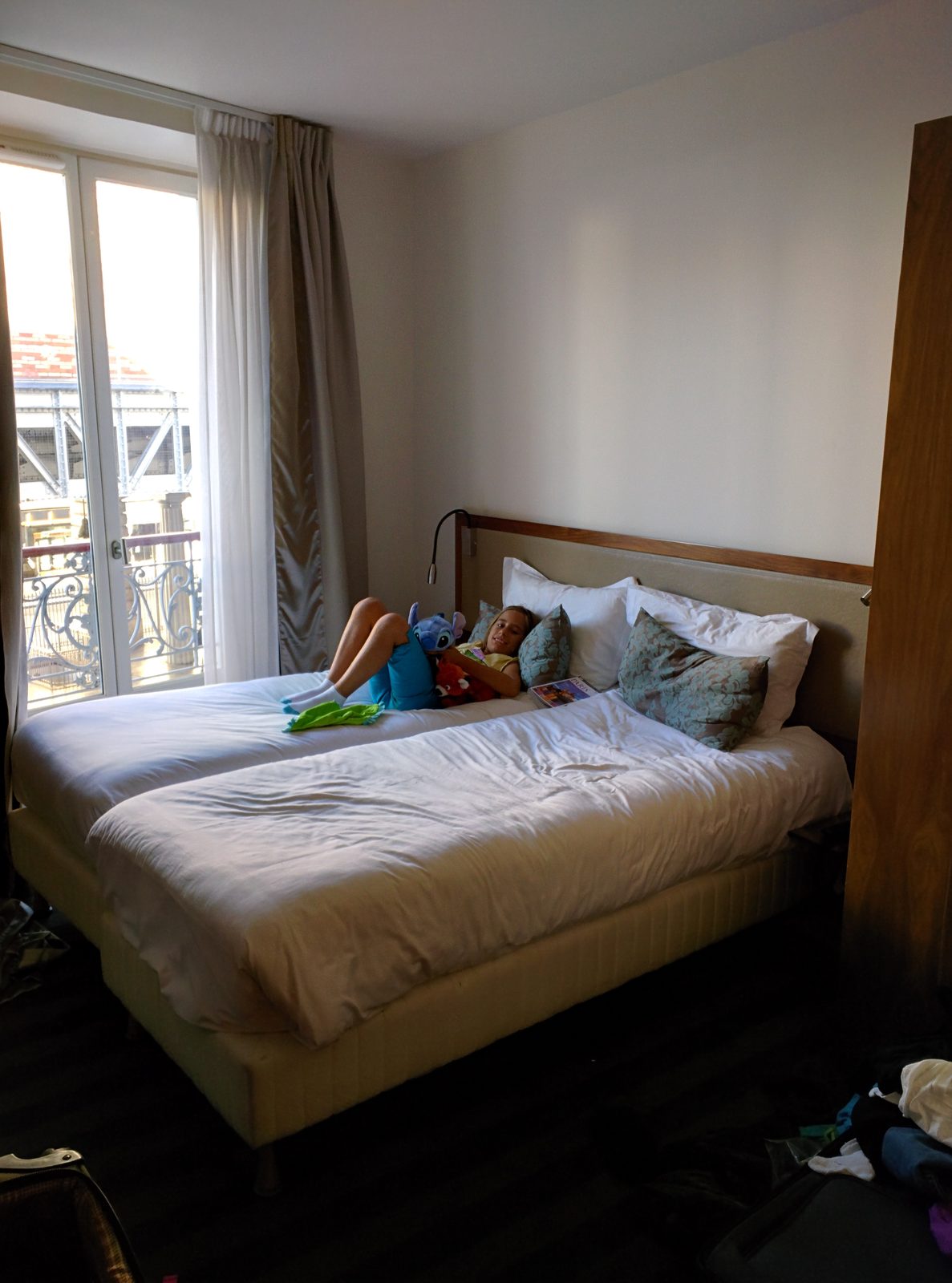 Lisa's stuffed animals waiting on the hotel bed