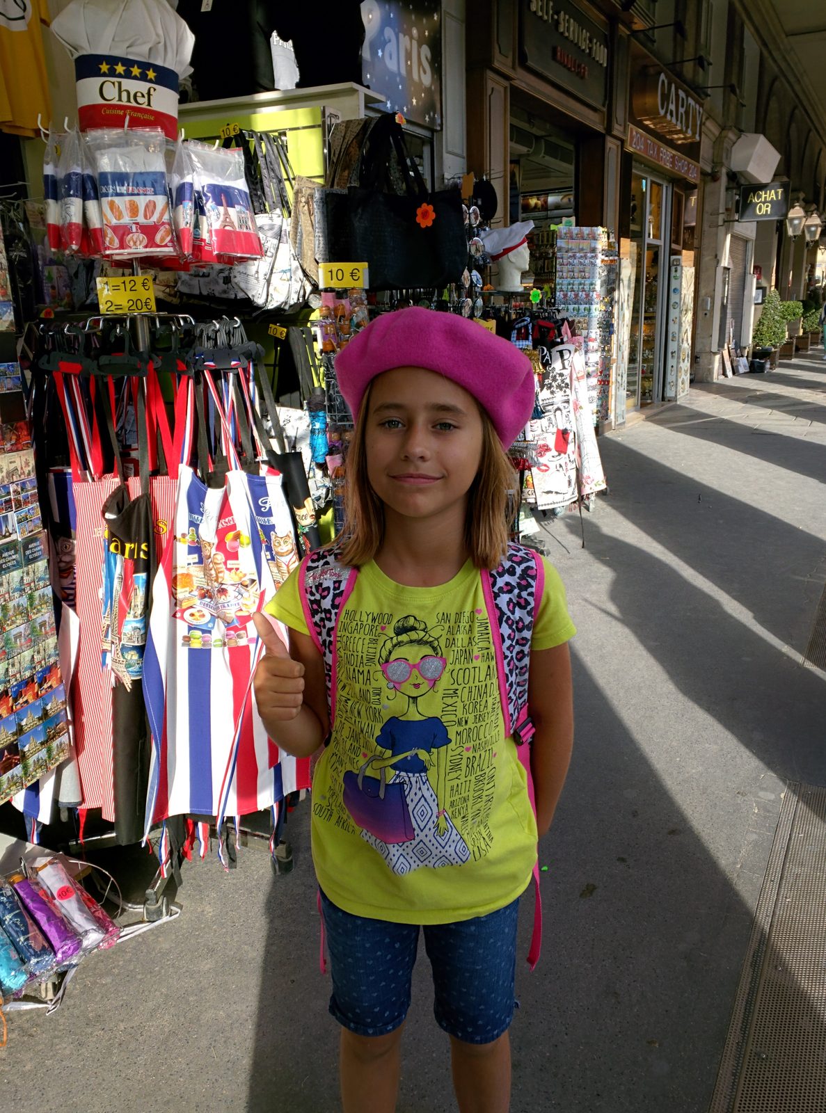 Lisa in a beret on the Rue de Rivoli