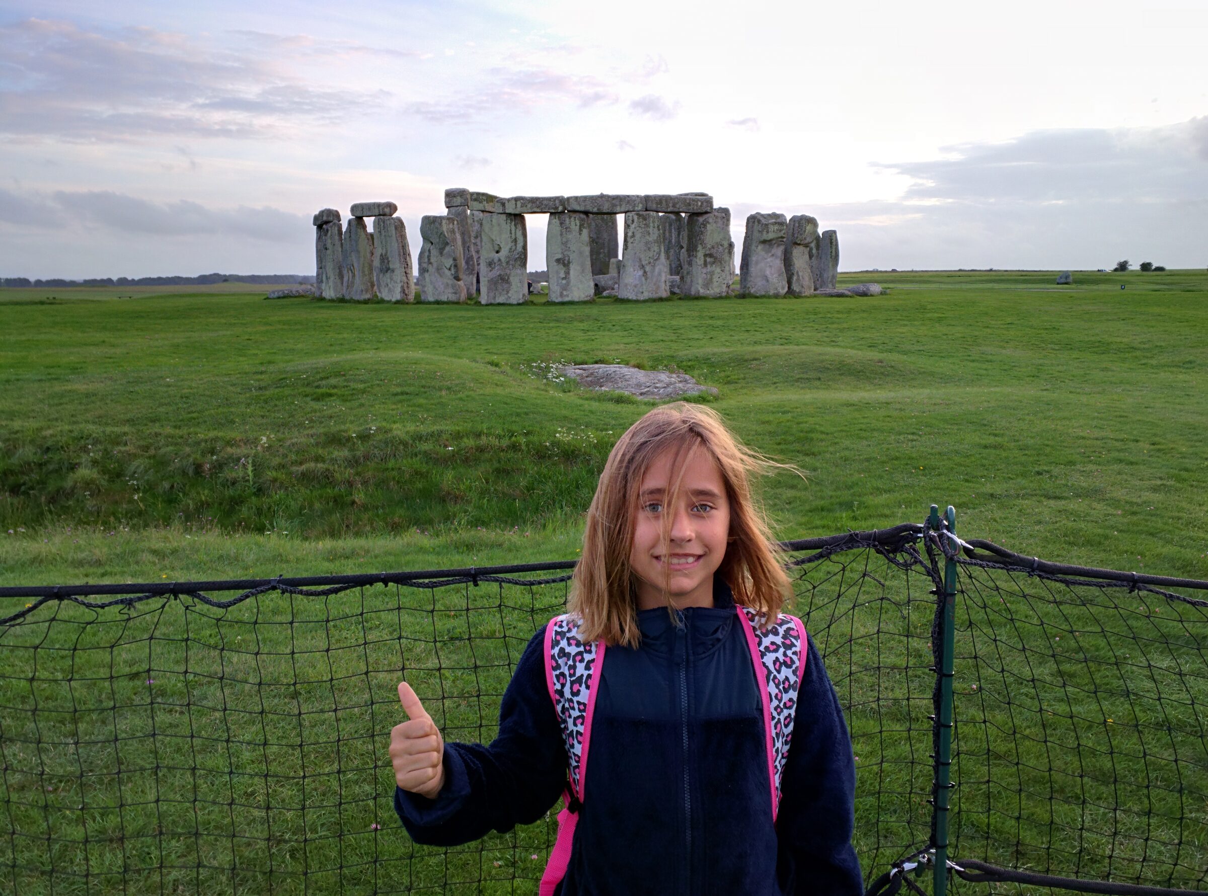Lisa's thumbs up in front of Stonehenge