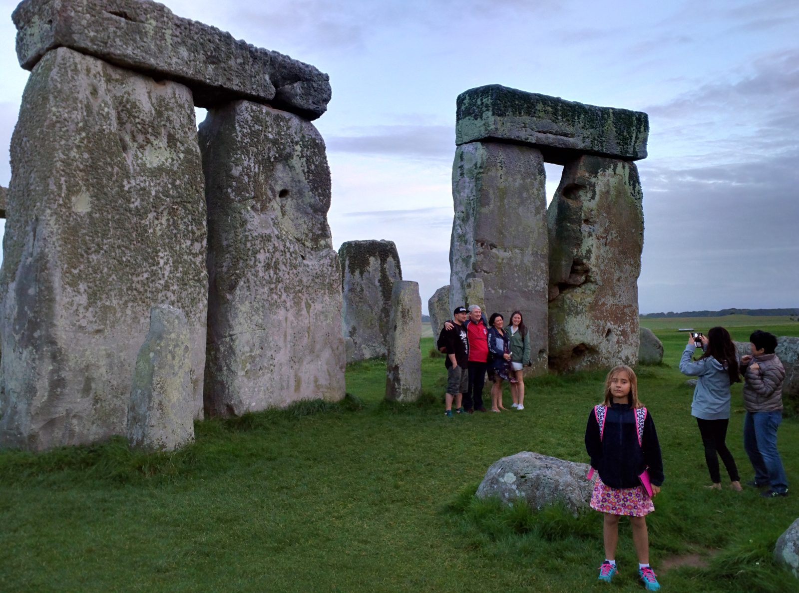 Lisa up close to the stones at Stonehenge