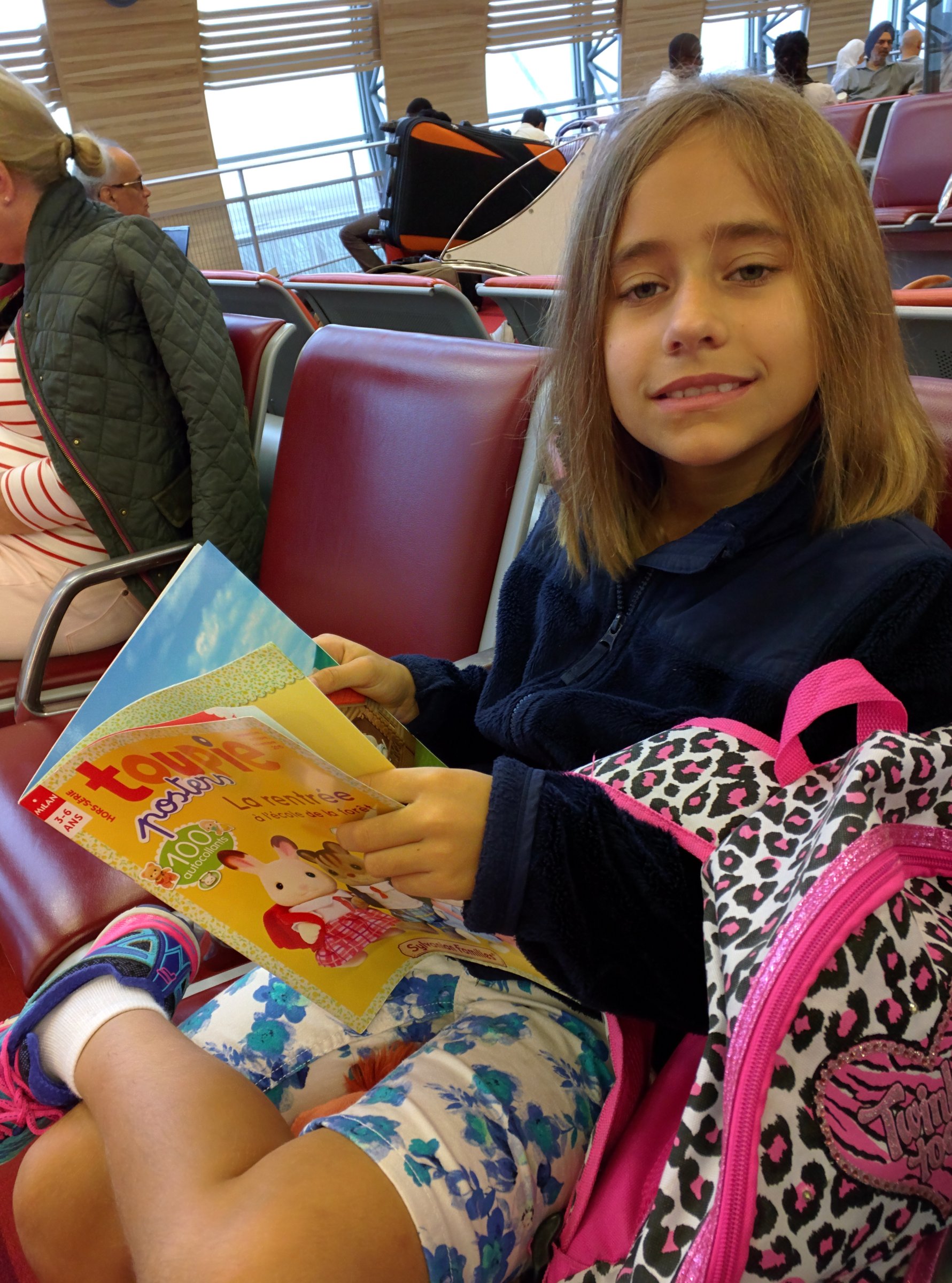 Lisa reading before the flight home