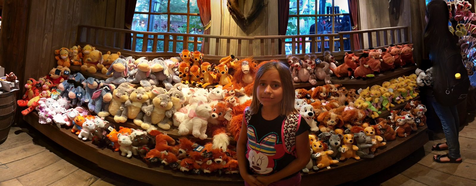 Lisa at the stuffed animals in a Disneyland shop