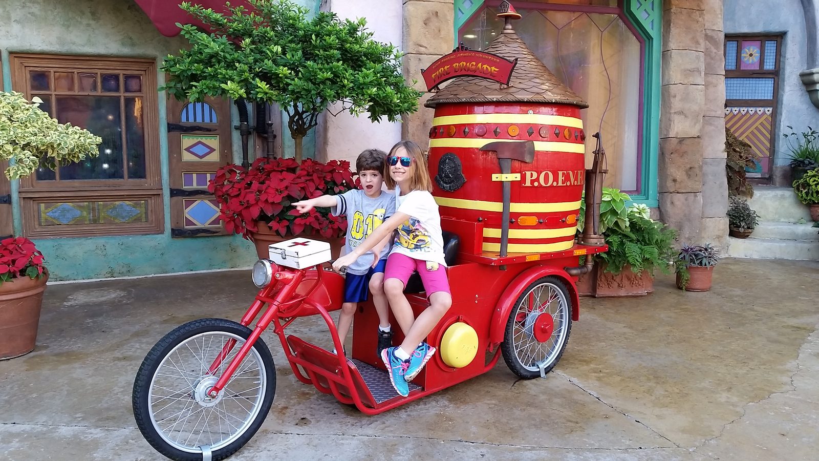 Lisa and Thomas on the red trike