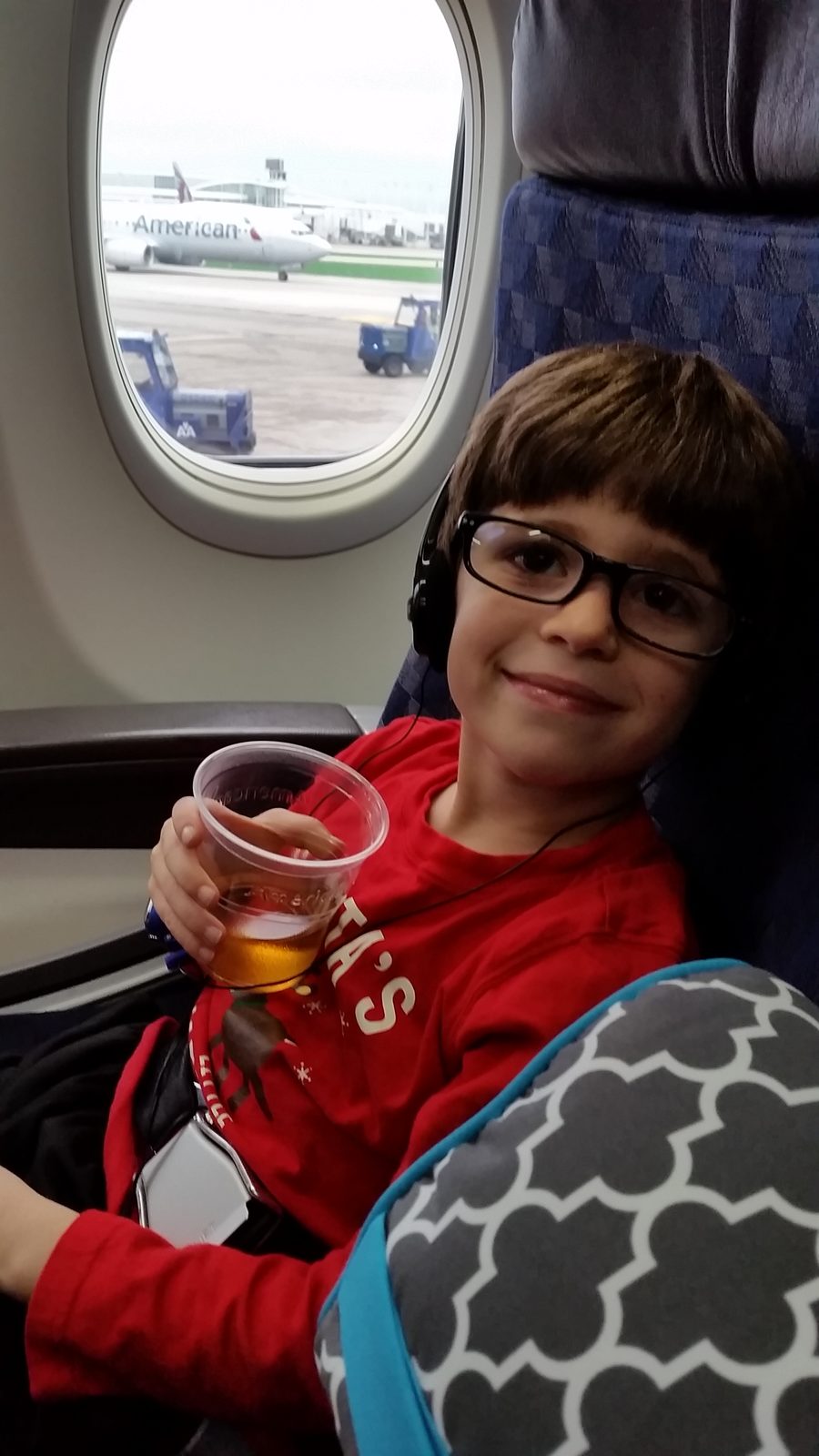 Thomas in first class at O'Hare